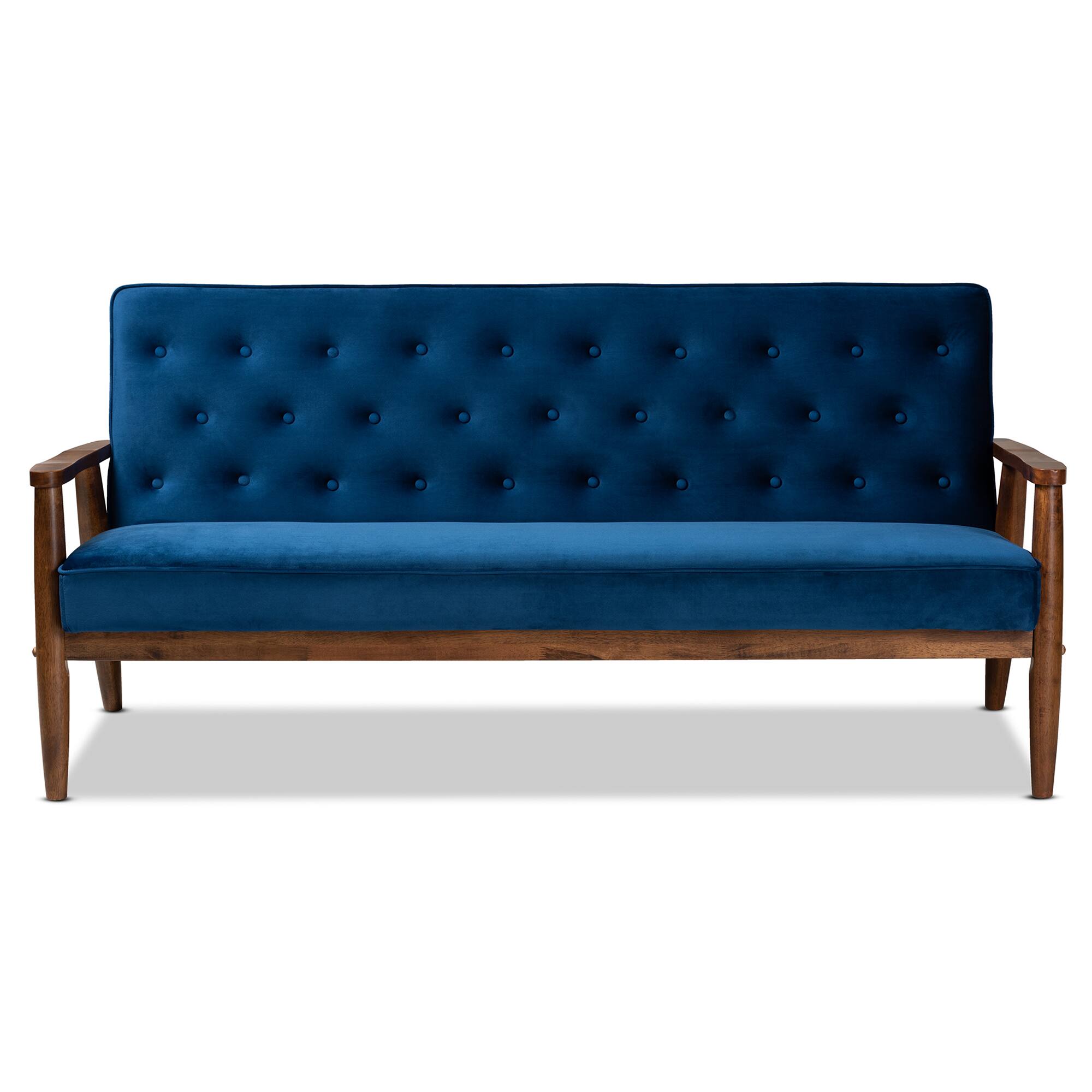 Angle. Baxton Studio - Sorrento Mid-century Modern Velvet Fabric Upholstered Walnut Finished Wooden 3-seater Sofa - Navy Blue/Brown.