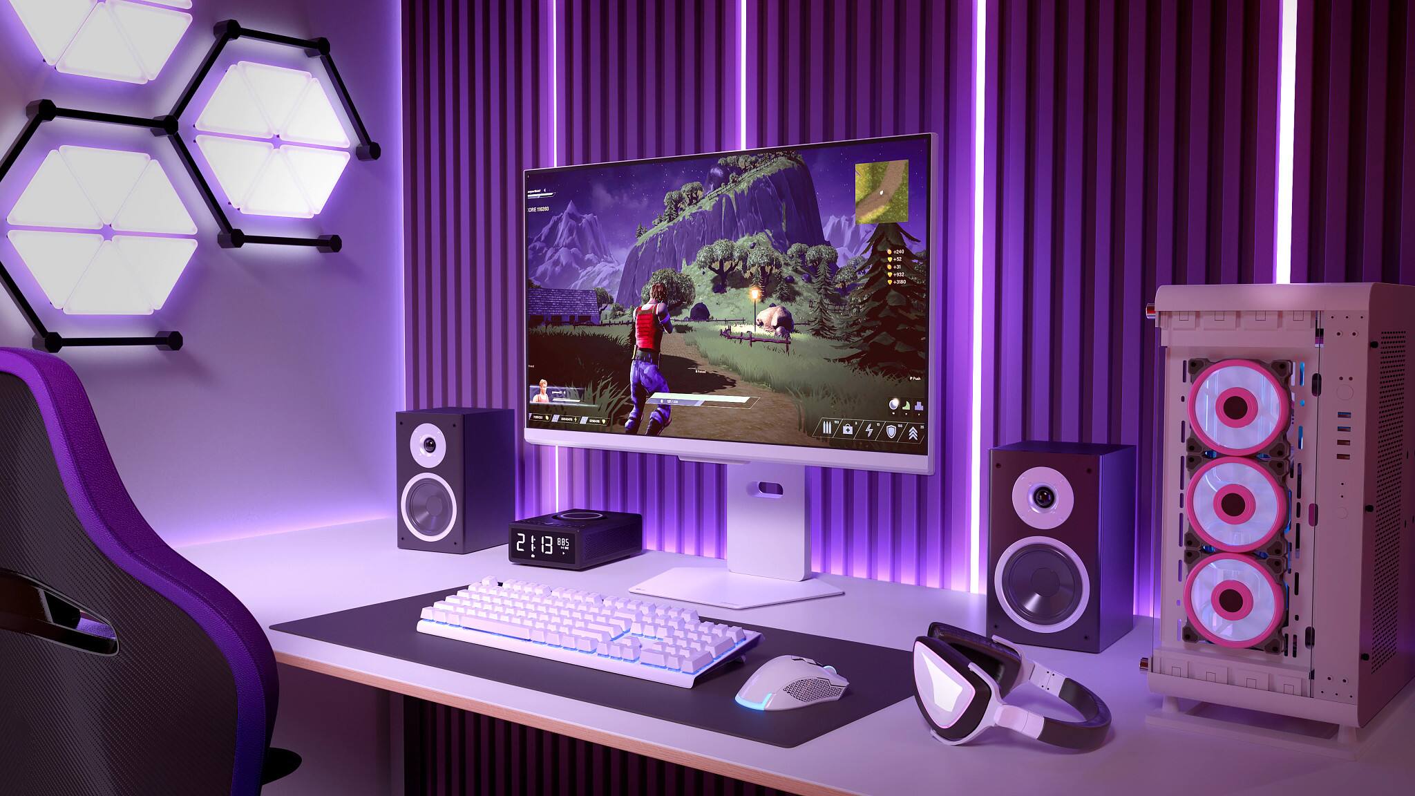 The text on the image reads: "A computer desk with a monitor, keyboard, speakers, and a chair."