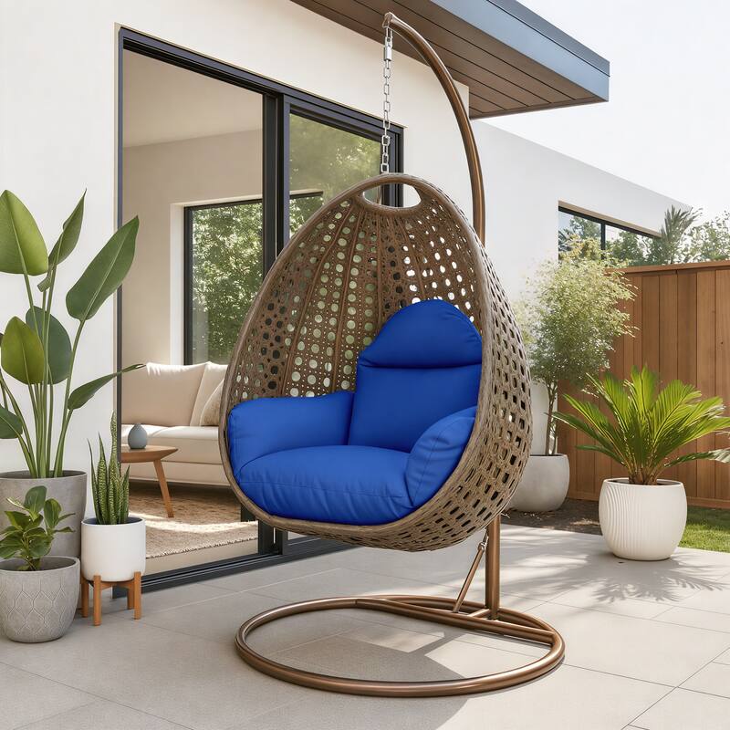 Angle. LeisureMod - LeisureMod Beige Wicker Hanging Egg Chair with Iron Stand & Cushion - All-Weather Single Outdoor Patio Swing - Blue.