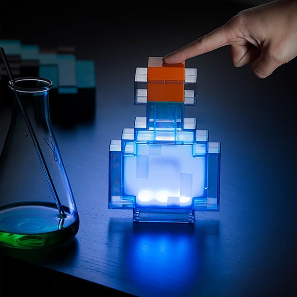 Alt View 1. ThinkGeek - Minecraft 7" Light-Up Color Changing Potion Bottle - Multi-Color.