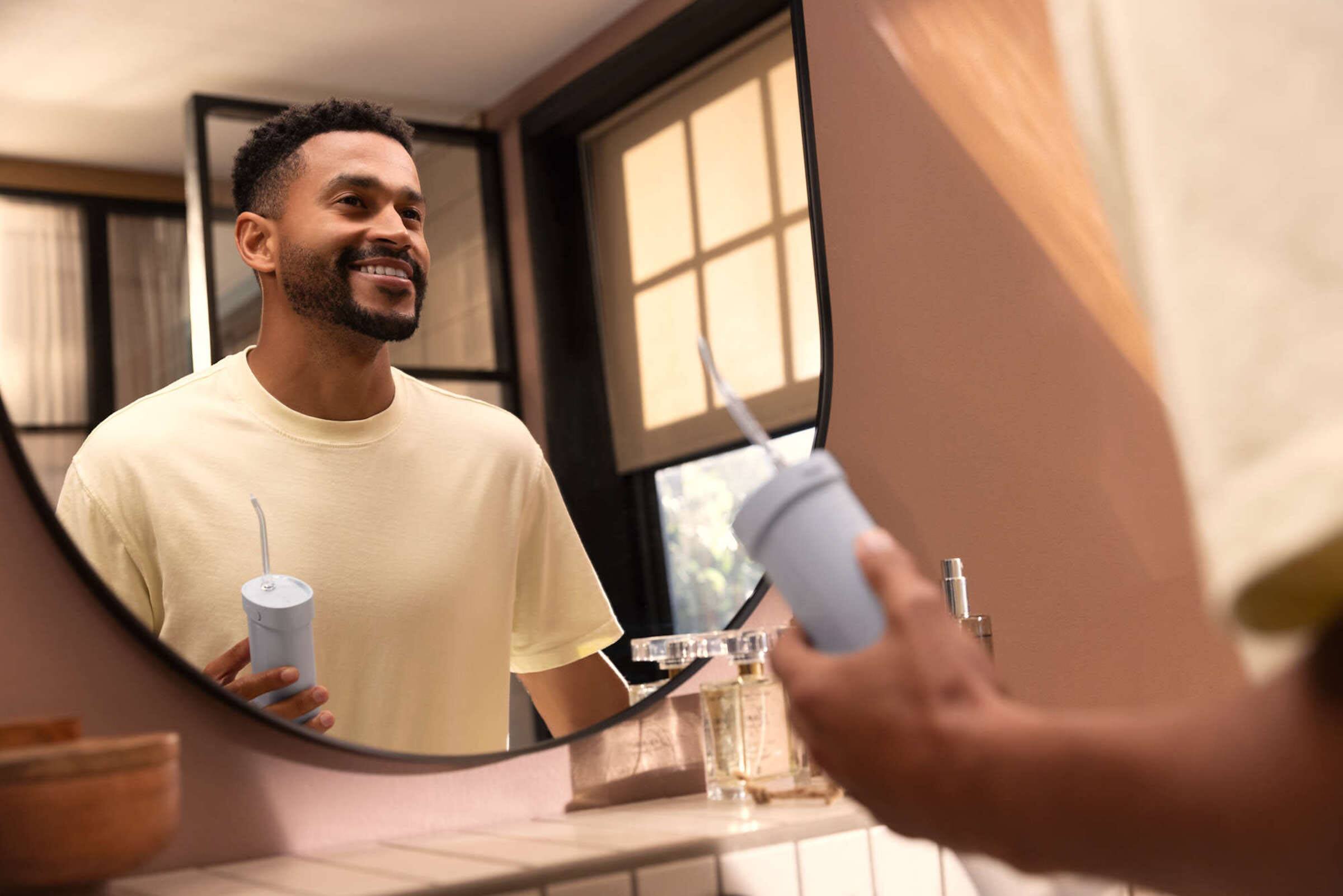 Left. Philips Sonicare - Philips Sonicare Compact Flosser 1000, Blue - Blue.