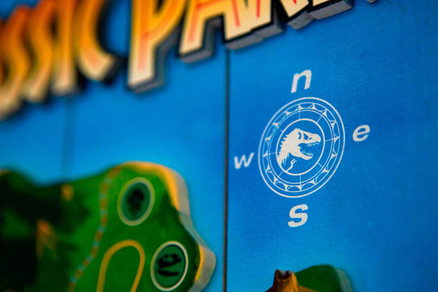 Alt View 2. PopMarket - Jurassic Park - Woodart 3D - Isla Nublar 12"x16" Hanging Sign   - COLLECTIBLES - Multicolor.