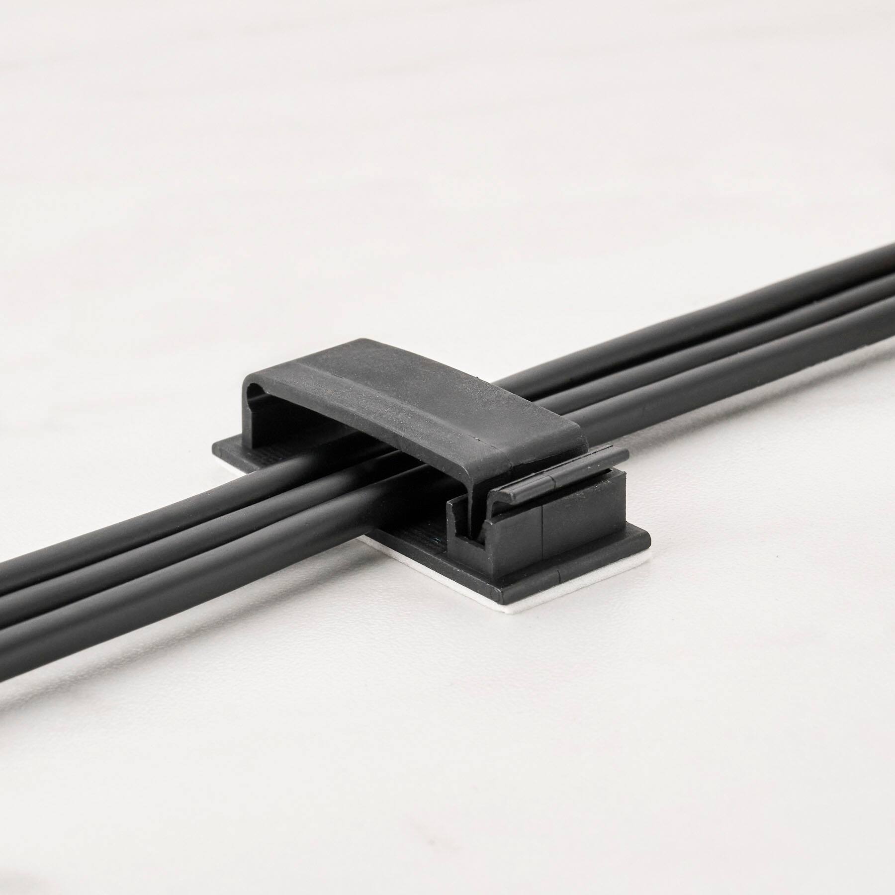 Left. Wrap-It Storage - Cable Guides - Black.