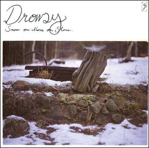 Drowsy  
Snow on Moss on Stone.