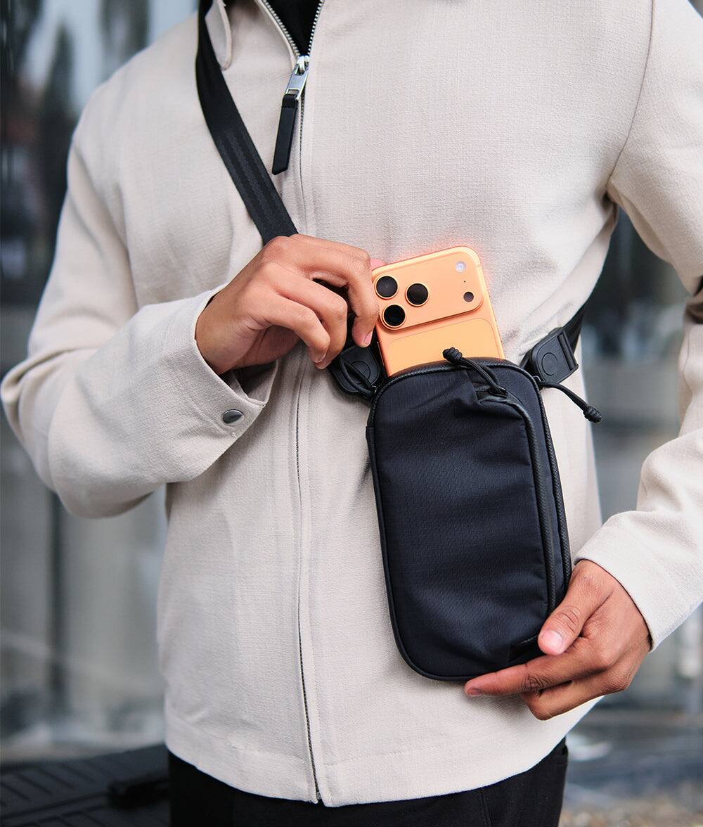 Alt View 9. ALPAKA - Bravo Passport Pouch Sling Bag for Men, Passport Holder for Travel, Fits iPhone Pro Max, RFID, AirTag Sleeve - Black Axoflux 210D.