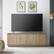 Alt View 1. Henn & Hart - Presque TV Stand for TV's up to 75" - Antiqued Gray Oak.