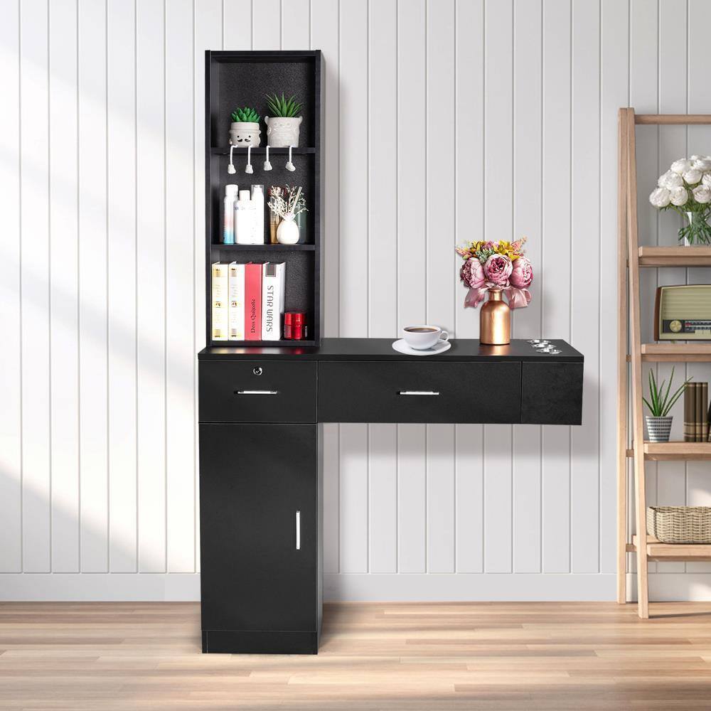 A tall, black shelving unit with a desk-like top is positioned against a white paneled wall. The unit features multiple shelves holding various items, including books, plants, and decorative objects. On the top shelf, there are two small potted plants and a set of white headphones. The second shelf from the top has a few bottles and a small vase with dried flowers. The third shelf contains a stack of books, including one titled "STAR WARS," and a red cylindrical object. The desk surface has a small white cup and saucer, a copper vase with a bouquet of flowers, and a few other small items. To the right, there is a wooden ladder-style shelf with a few items, including a framed certificate and a small potted plant.