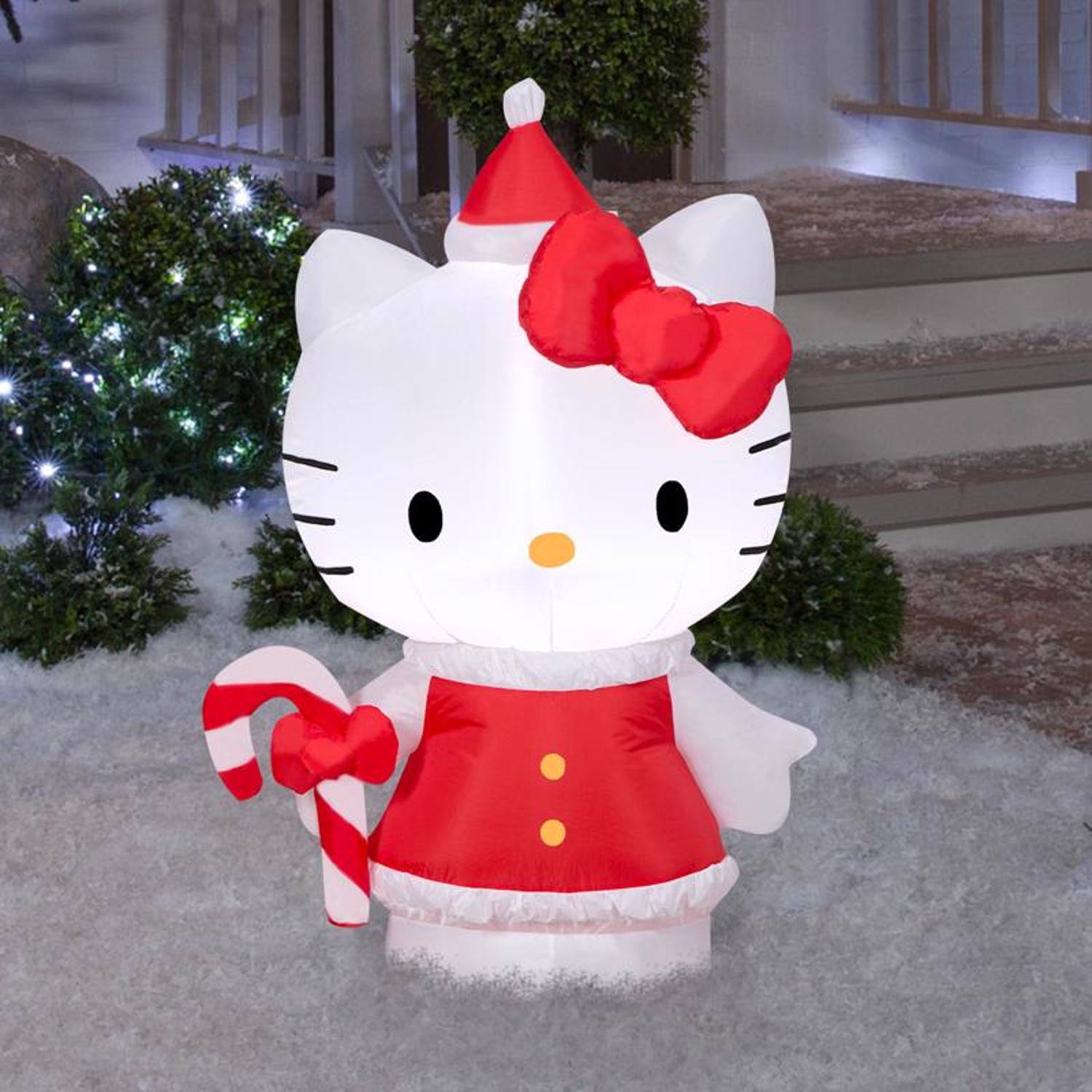 Left. Hello Kitty - Hello Kitty Airblown LED Hello Kitty in Holiday Dress 4 ft. Inflatable - Multicolored.