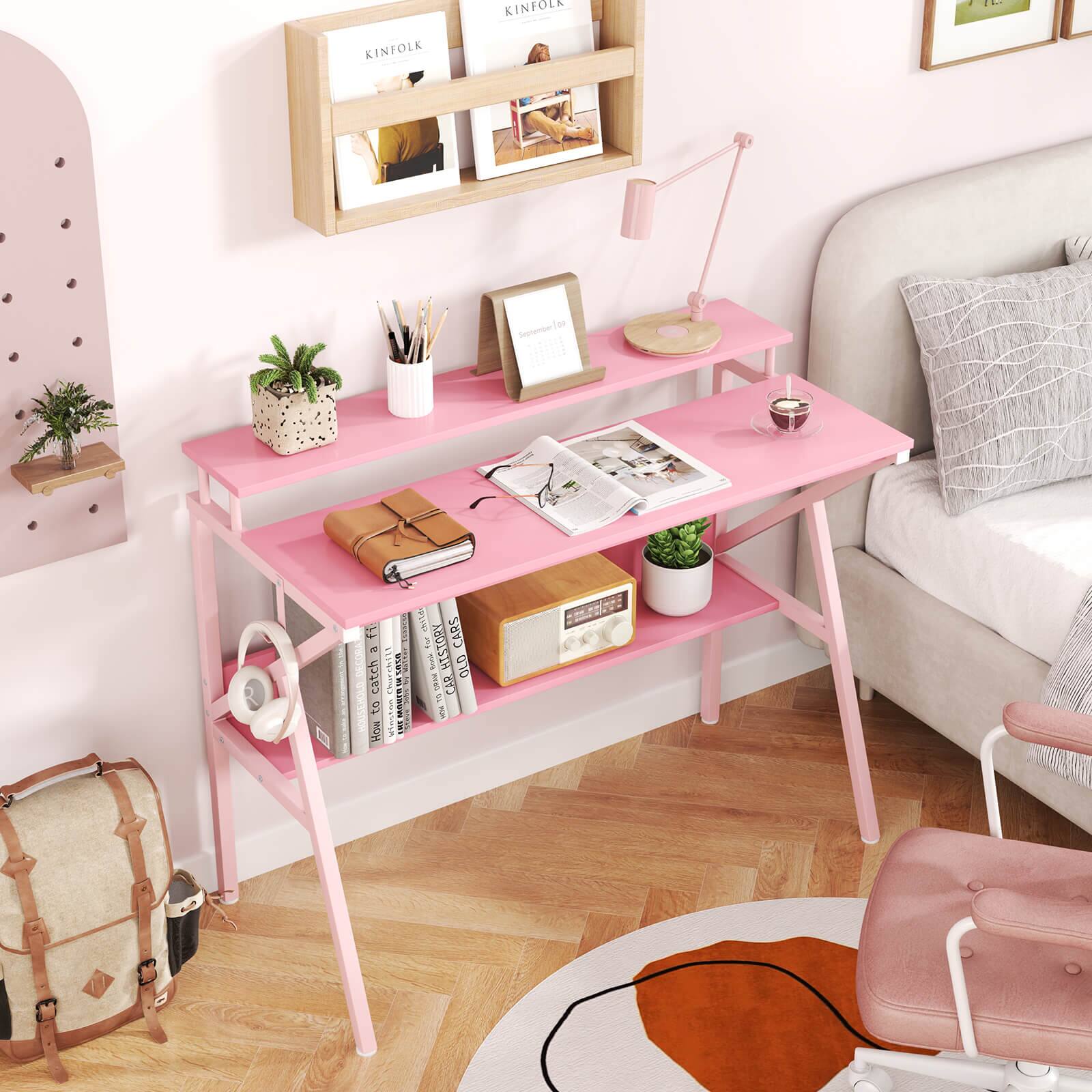 Sure, here is the corrected and grouped text from the image:

- KINFOLK
- KINFOLK
- SCOR 50
- catch
- Chortkil
- How
- A
- CARS
- TORY
- Rm
- HTST
- G10
- RE 3

The text appears to be a mix of words and numbers, possibly from a magazine or book on the desk.