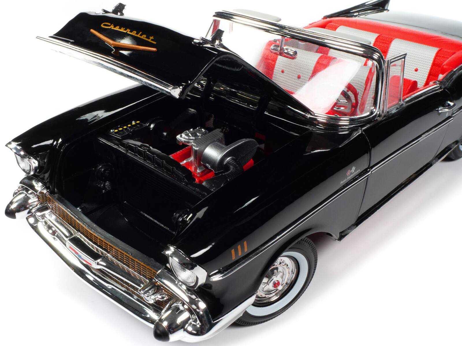 Left. Autoworld - 1957 Chevrolet Bel Air Convertible Onyx Black James Bond 007 "Dr. No" (1962) Movie "60 Years of Bond" Series 1/18 - Black.