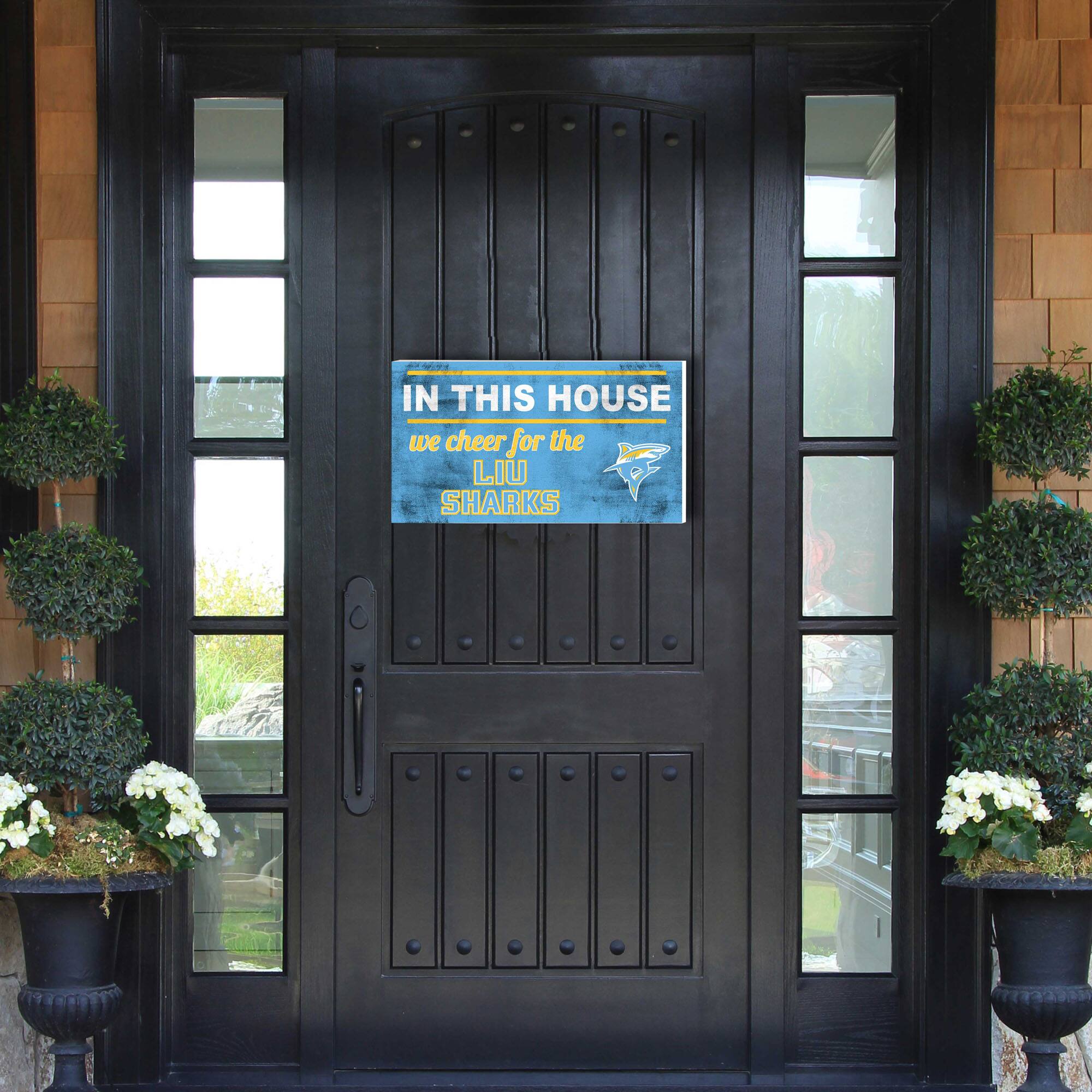 IN THIS HOUSE  
we cheer for the  
LIU SHARKS