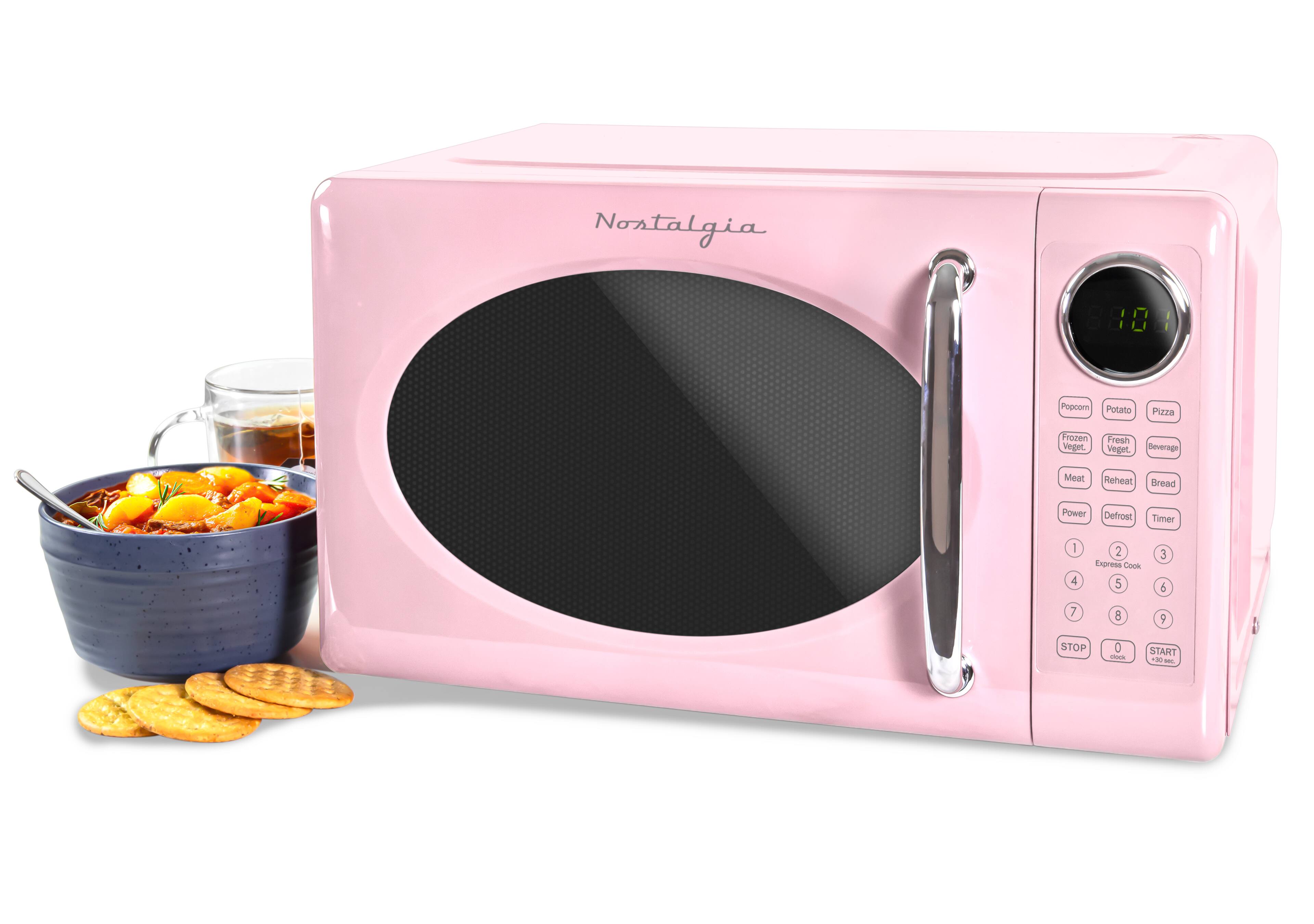 Nostalgia 880

Popcorn Potato Pizza Frozen Veget Fresh Veget Beverage Meat Reheat Bread Power Defrost Timer

1 2 3 4 5 6 7 8 9 0 hs

STOP START