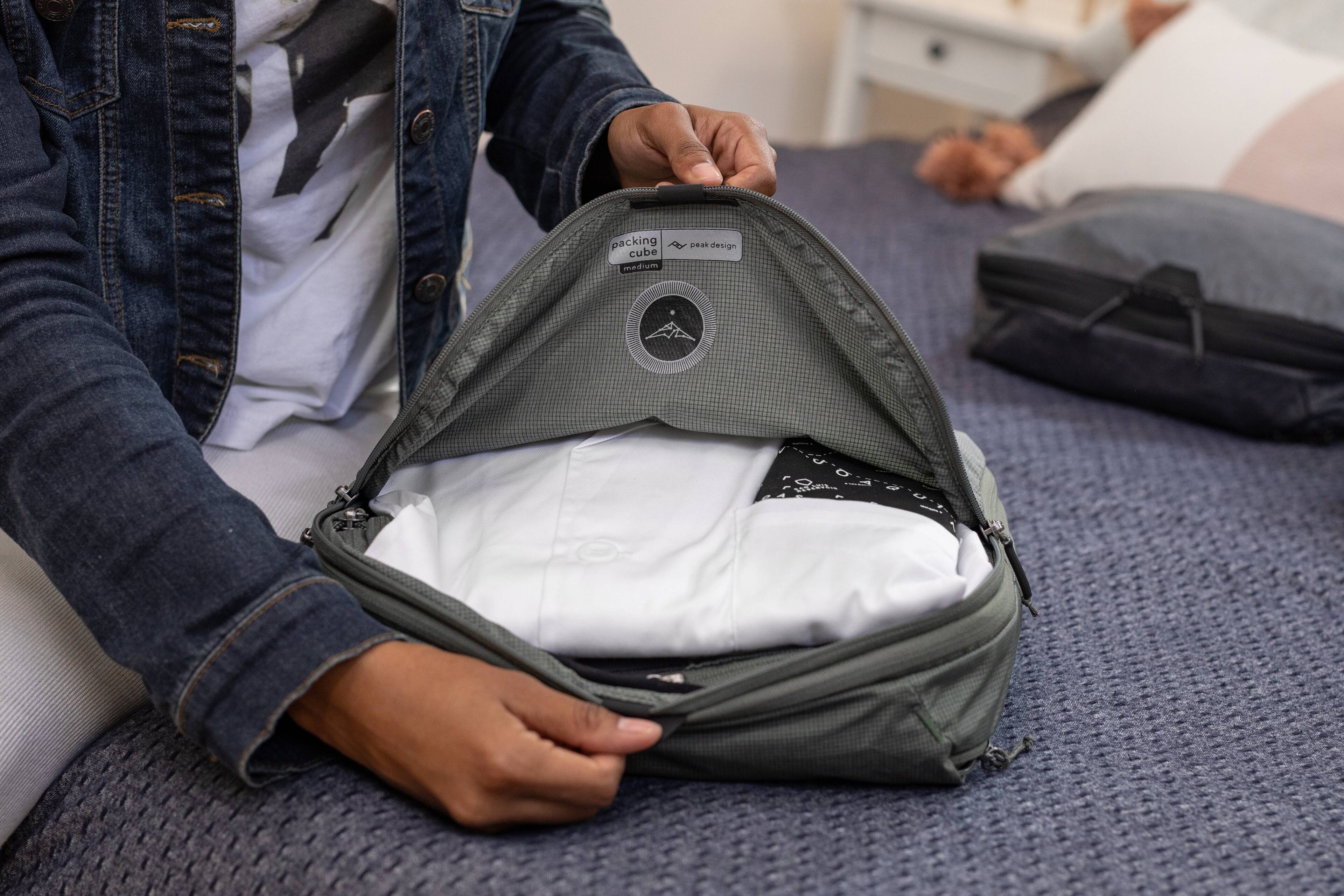 The text on the image reads "packing cube me-drm wmah design."