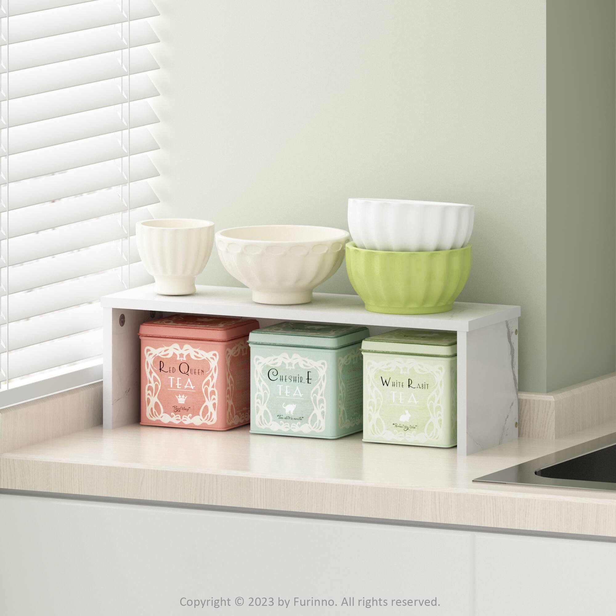 Sure, here is the corrected and grouped text:

---

**Tea Tins:**

- Red Queen Tea
- Cheshire Tea
- White Rabbit Tea

**Copyright:**

- Copyright © 2023 by Furinno. All rights reserved.

---