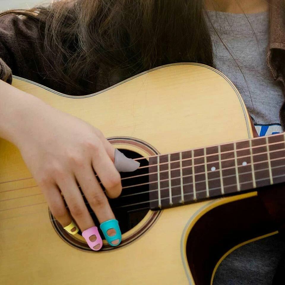 Alt View 4. Home Collection - 35pcs Guitar Silicone Finger Protector Fingertip Covers Caps + 5pcs Guitar Picks - Multi-color.