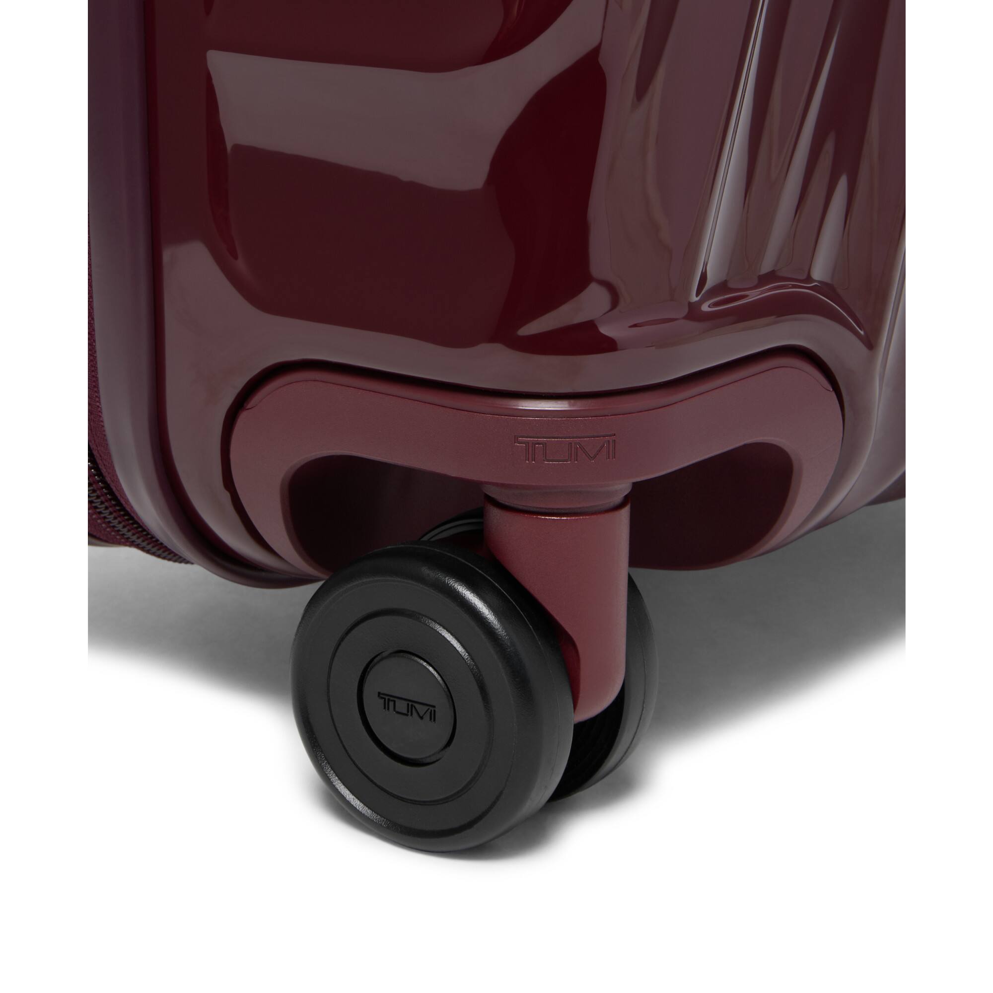 The text on the image is "TUMI."