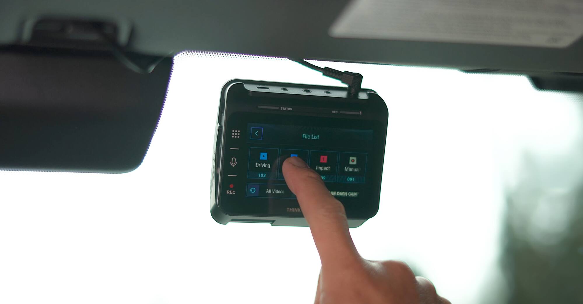 STATUS RBC  
File List  
Driving 103  
Impact 19  
Manual 001  
REC  
All Videos  
RE DASH CAM  
THINK