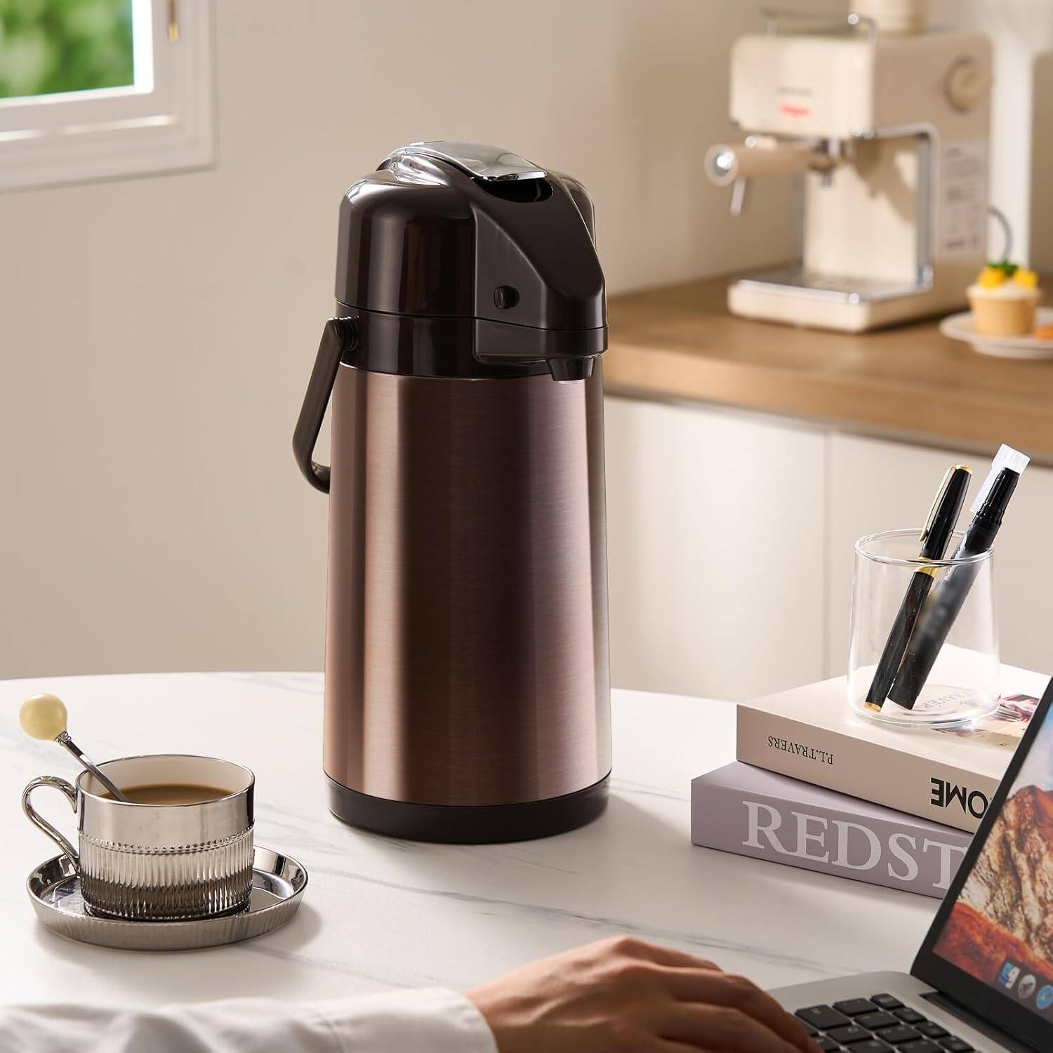 P.L. Travers  
RED ST