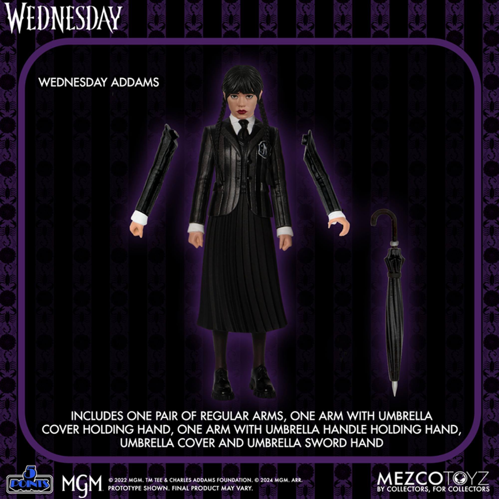 WEDNESDAY ADDAMS INCLUDES ONE PAIR OF REGULAR ARMS, ONE ARM WITH UMBRELLA COVER HOLDING HAND, ONE ARM WITH UMBRELLA HANDLE HOLDING HAND, UMBRELLA COVER AND UMBRELLA SWORD HAND. © 2022 MGM. TM TEE & CHARLES ADDAMS FOUNDATION. 2024 MGM. AR. PROTOTYPE SHOWN. FINAL PRODUCT MAY VARY. MEZCOTOYZ BY COLLECTORS, FOR COLLECTORS