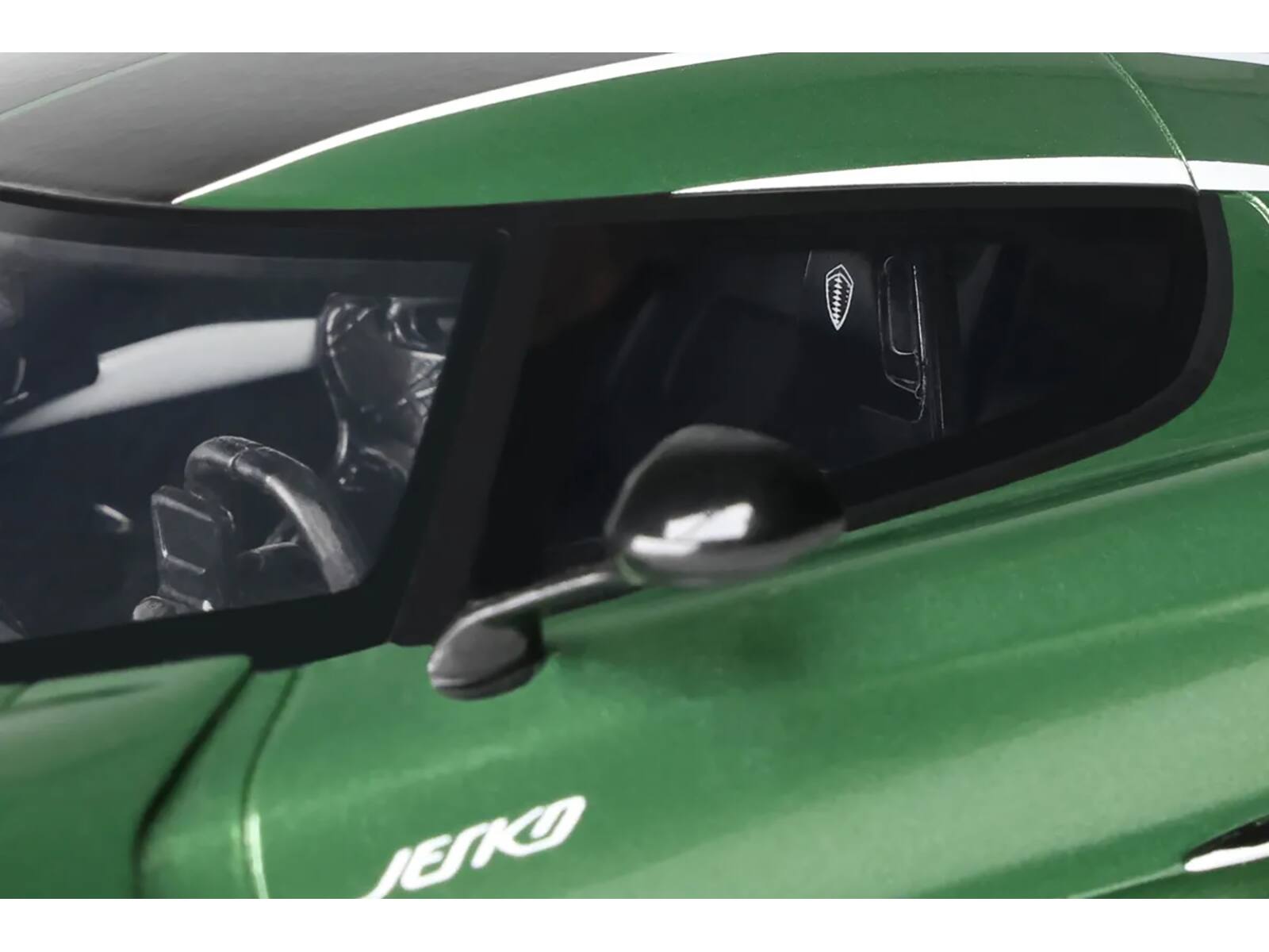 Angle. GT Spirit - Koenigsegg Jesko Green Metallic with Black Stripes 1/18 Model Car by GT Spirit - Green Metallic with Black.