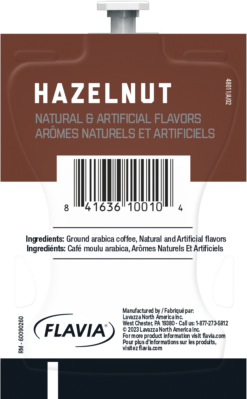 48011 HAZELNUT 1/A/02 NATURAL & ARTIFICIAL FLAVORS AROMES NATURELS ET ARTIFICIELS

8 41636 10010 4

Ingredients: Ground arabica coffee, Natural and Artificial flavors
Ingredients: Café moulu arabica, Aromes Naturels Et Artificiels

RM-60090260

Manufactured by / Fabriqué par: Lavazza North America Inc. West Chester, PA 19380 - Call us: 1-877-273-5812

FLAVIA

© 2023 Lavazza North America Inc. For more product information visit flavia.com
Pour plus d'informations sur les produits, visitez flavia.com