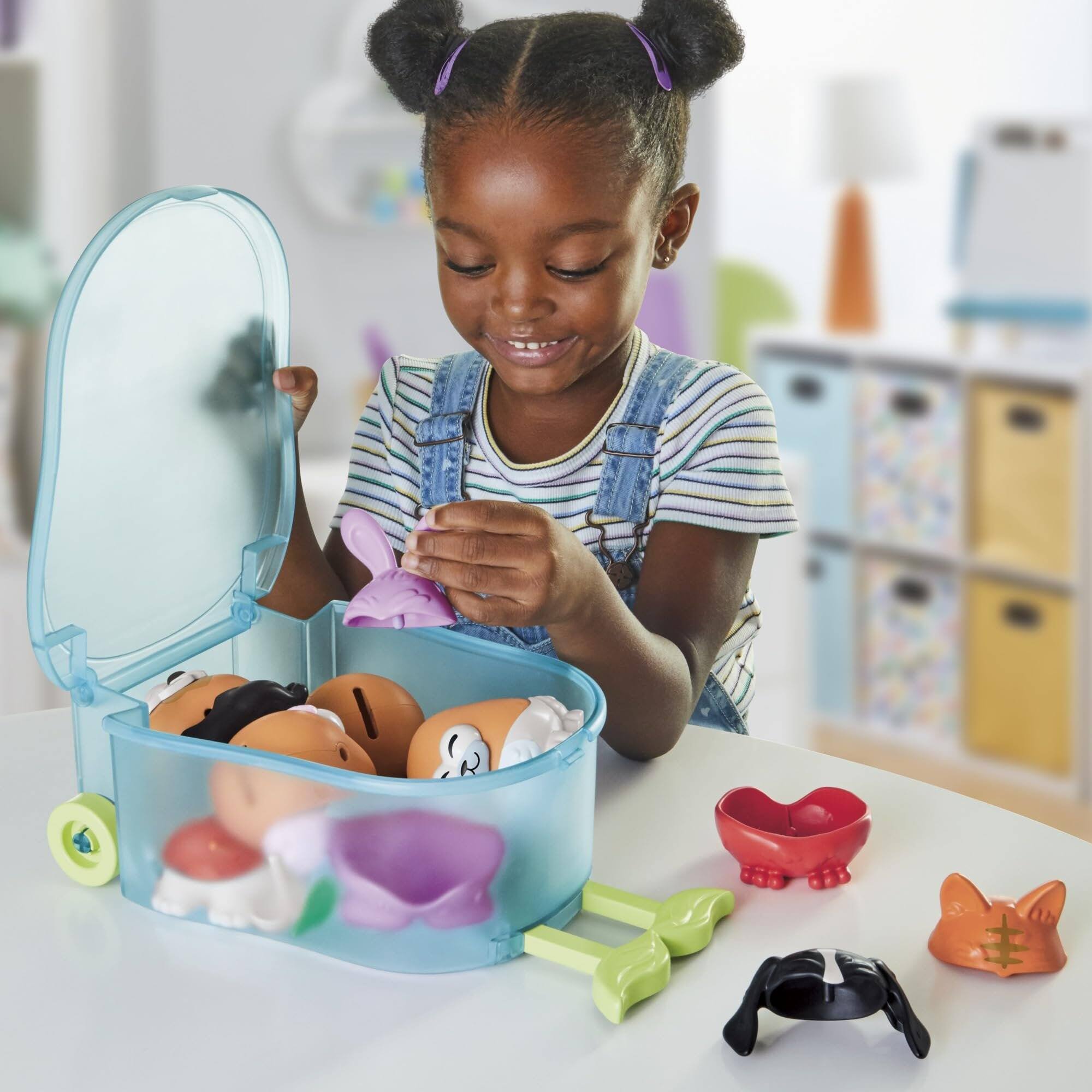 Left. Hasbro - Mr. Potato Head Pet-Tato Tots Set, 31 Pieces with Rolling Carry Case, Mix & Match Pet Parts, Ages 3+ - Multicolor.
