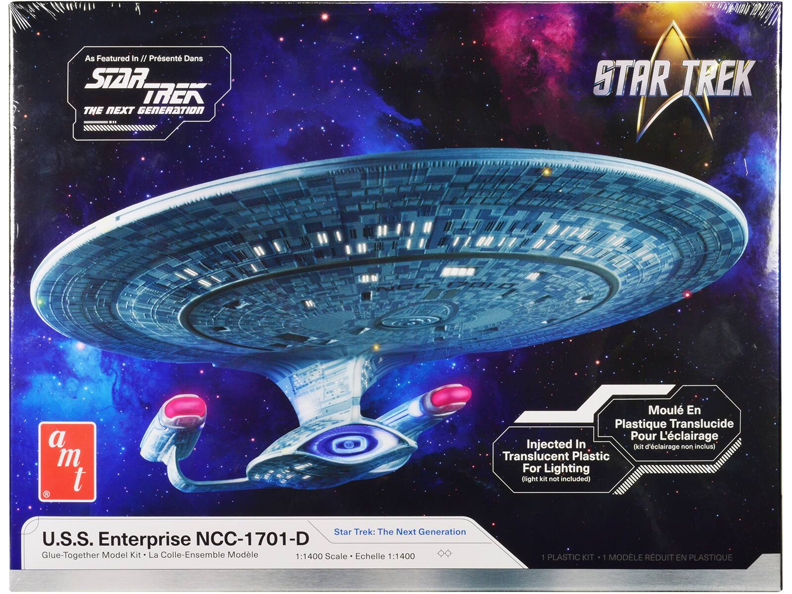 As Featured In / Présenté Dans
STAR TREK
THE NEXT GENERATION
U.S.S. Enterprise NCC-1701-D
Glue-Together Model Kit - La Colle-Ensemble Modèle
1:1400 Scale - Échelle 1:1400
Moulé En Plastique Translucide Pour L'éclairage
Injected In Translucent Plastic For Lighting (light kit not included)
1 PLASTIC KIT - 1 MODÈLE RÉDUIT EN PLASTIQUE
a m t
Star Trek: The Next Generation
1:1400 Scale - Échelle 1:1400