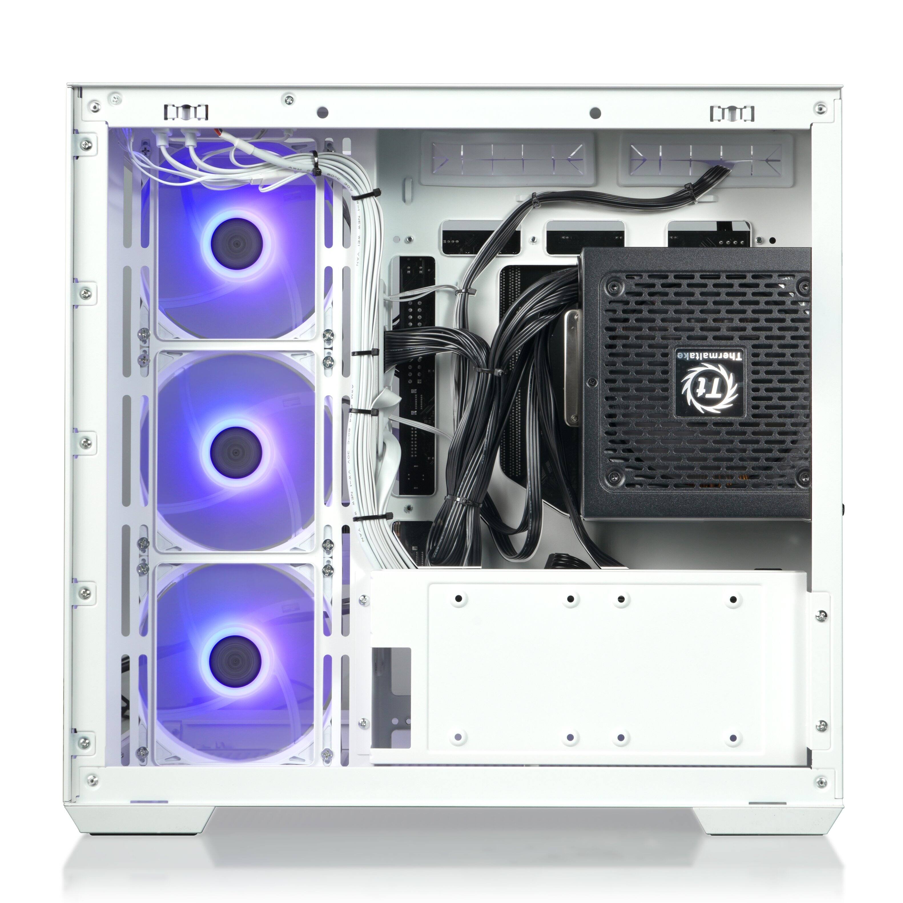 The image shows a computer tower with a Thermaltake Tt logo on the side. The tower is white and has a black speaker on the side. The interior of the tower is open, revealing the components inside. There are multiple fans and cables visible, as well as a power supply and a hard drive. The tower is well-organized and appears to be a high-performance system.