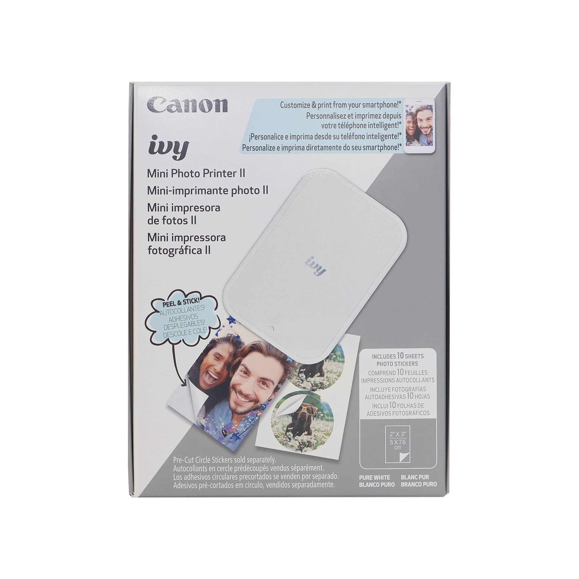 Canon Customize & print from your smartphone!  
Personnalisez et imprimez depuis votre téléphone intelligent!  
Personalice e imprima desde su teléfono inteligente!  
Personalize e imprima diretamente do seu smartphone!  
Mini Photo Printer II  
Mini-imprimante photo II  
Mini impresora de fotos II  
Mini impressora fotográfica II  

PEEL & STICK  
AUTOCOLLANTS ADHÉSIVES  
DESCOLE E COLE  
INCLUYE FOTOGRAFIAS AUTOADHESIVAS  
INCLUYE 10 HOJAS DE ADESIVOS FOTOGRAFICOS  
INCLUDES 10 SHEETS PHOTO STICKERS  
COMPREND 10 FEUILLES IMPRESSIONS AUTOADHÉSIVES  

Pre-Cut Circle Stickers sold separately  
Autocollants en cercle prédécoupés vendus séparément.  
Los adhesivos circulares precortados se venden por separado.  
Adesivos pre-cortados em círculo, vendidos separadamente.  

2X3 5X76 un PURE WHITE  
BLANC PUR  
BLANCO PURO  
BRANCO PU