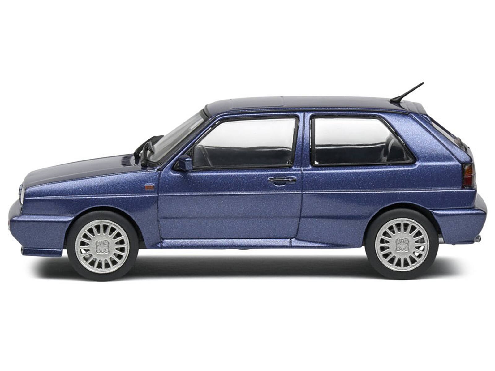 Angle. Solido - 1989 Volkswagen Golf Rallye G60 Syncro Blue Metallic 1/43 Diecast Model Car by Solido - Blue Metallic.