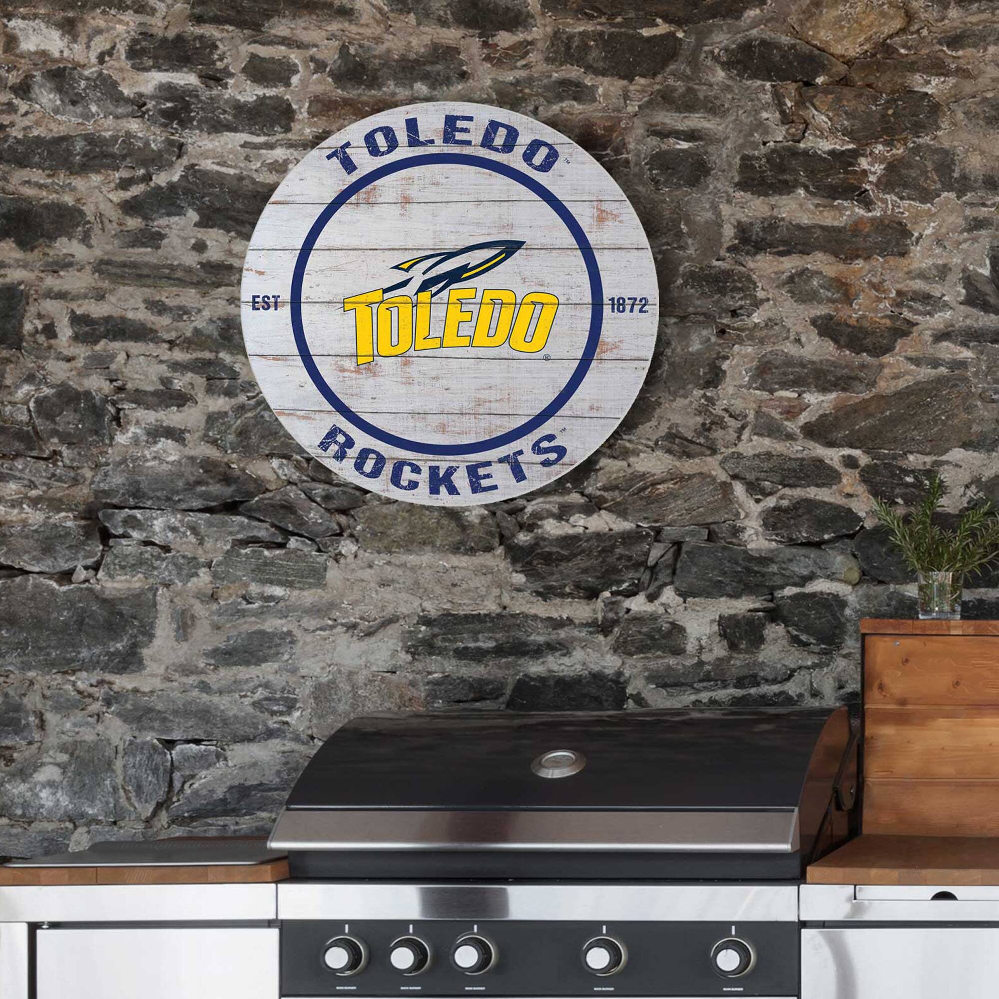 TOLEDO  
EST 1872  
TOLEDO ROCKETS