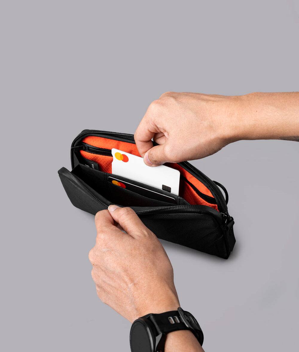 Alt View 2. ALPAKA - Flight Pouch Travel Clutch Phone Bag, Passport Holder, Crossbody Pouch, Wristlet, YKK AquaGuard Zippers - Black Ultradyne 100D.