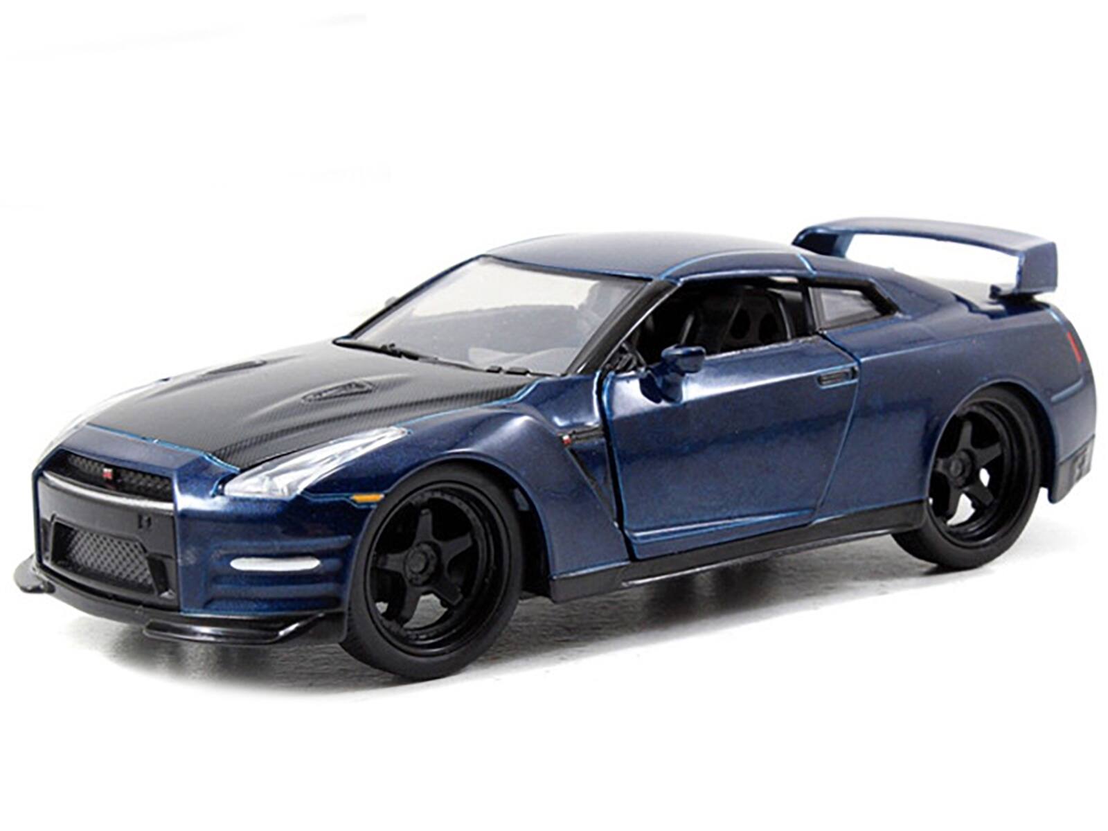 Angle. Jada - Brian's Nissan GT-R R35 Blue "Fast & Furious 7" Movie 1/32 Diecast Model Car by Jada - Blue with Carbon.