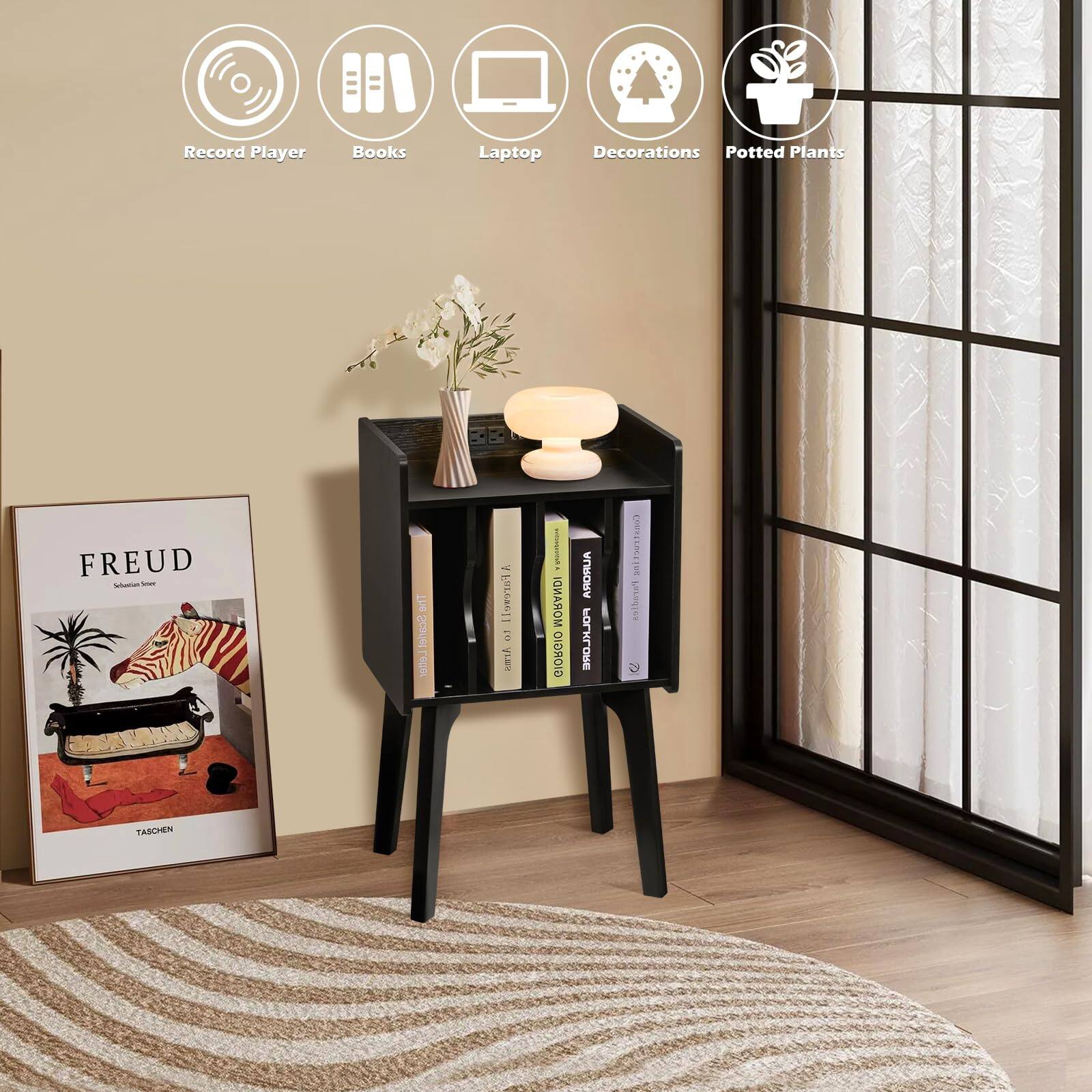 Record Player Books Laptop Decorations Potted Plants

FREUD  
Sigmund Freud  
TASCHEN

Let's Get Lost  
J. R. A.