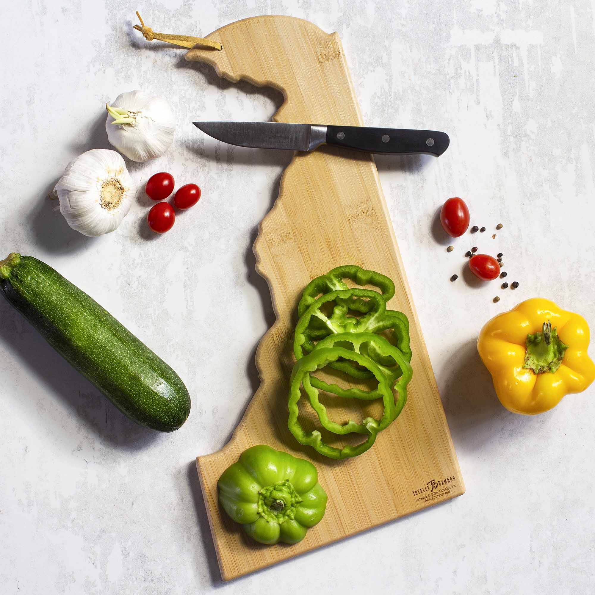 Left. Totally Bamboo - Delaware Cutting Board with Artwork by Fish Kiss.