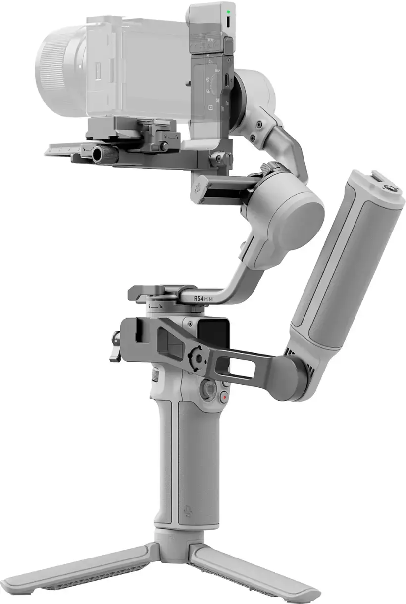 The image shows a robotic arm with a camera attached to it. The arm is made of metal and has a white color. The camera is positioned at the top of the arm, and the arm is placed on a stand. The robotic arm is designed to hold and operate the camera, providing a stable and precise platform for capturing images or videos.