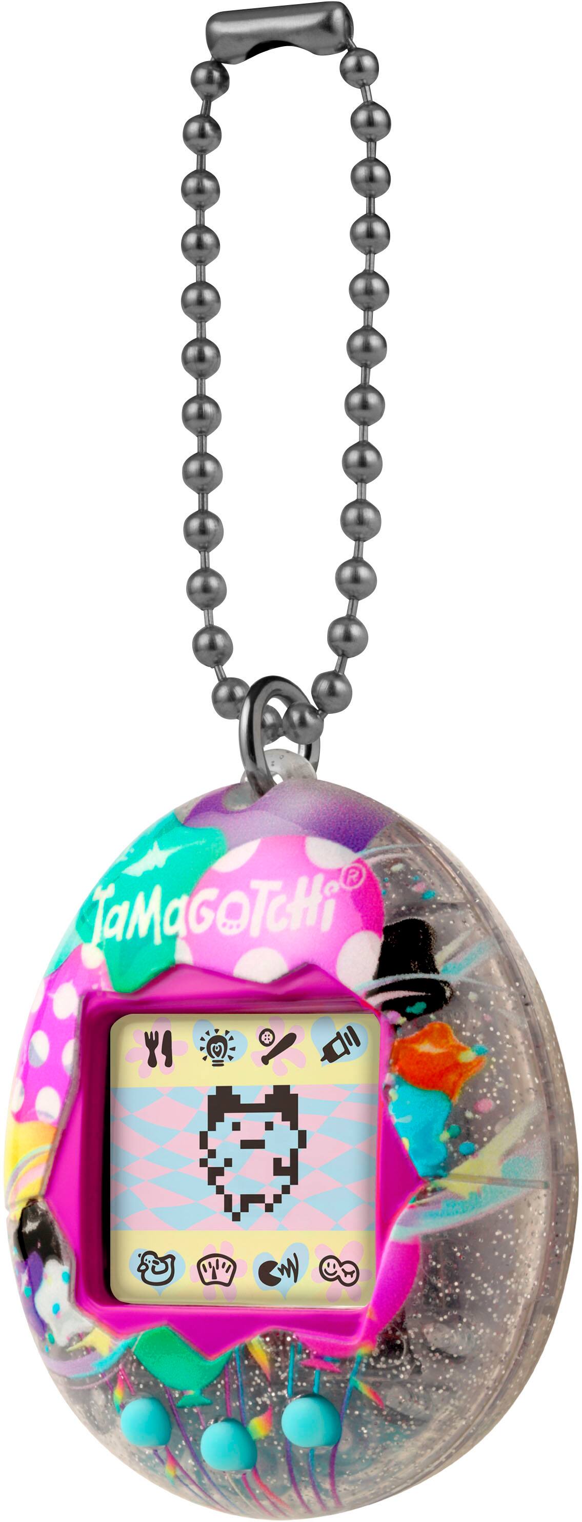 Left. Bandai - Original Tamagotchi - Pretty Party.