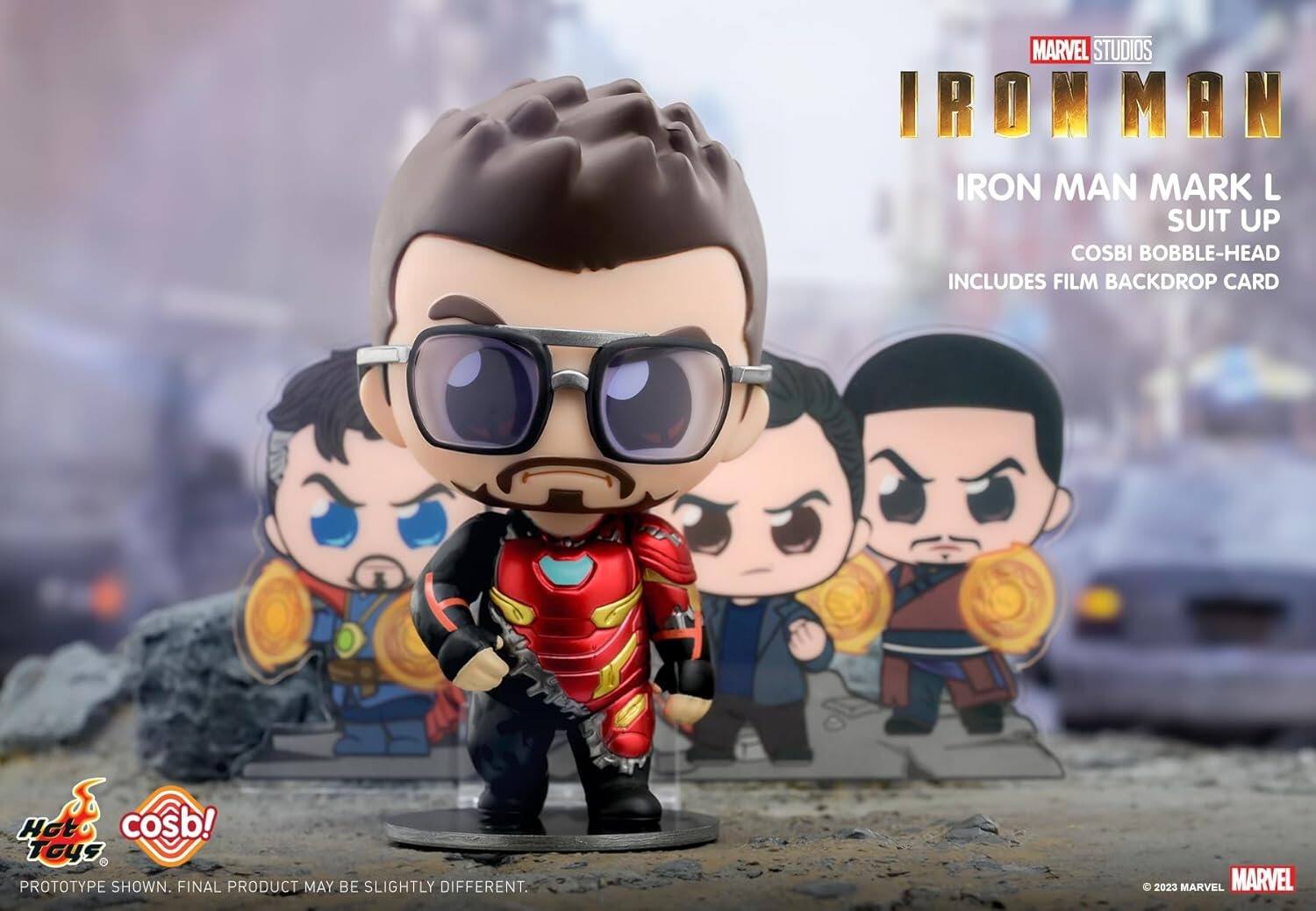 MARVEL STUDIOS IRON MAN IRON MAN MARK L SUIT UP COSBI BOBBLE-HEAD INCLUDES FILM BACKDROP CARD  
Hot Toys  
cosb!  
PROTOTYPE SHOWN. FINAL PRODUCT MAY BE SLIGHTLY DIFFERENT.  
© 2023 MARVEL