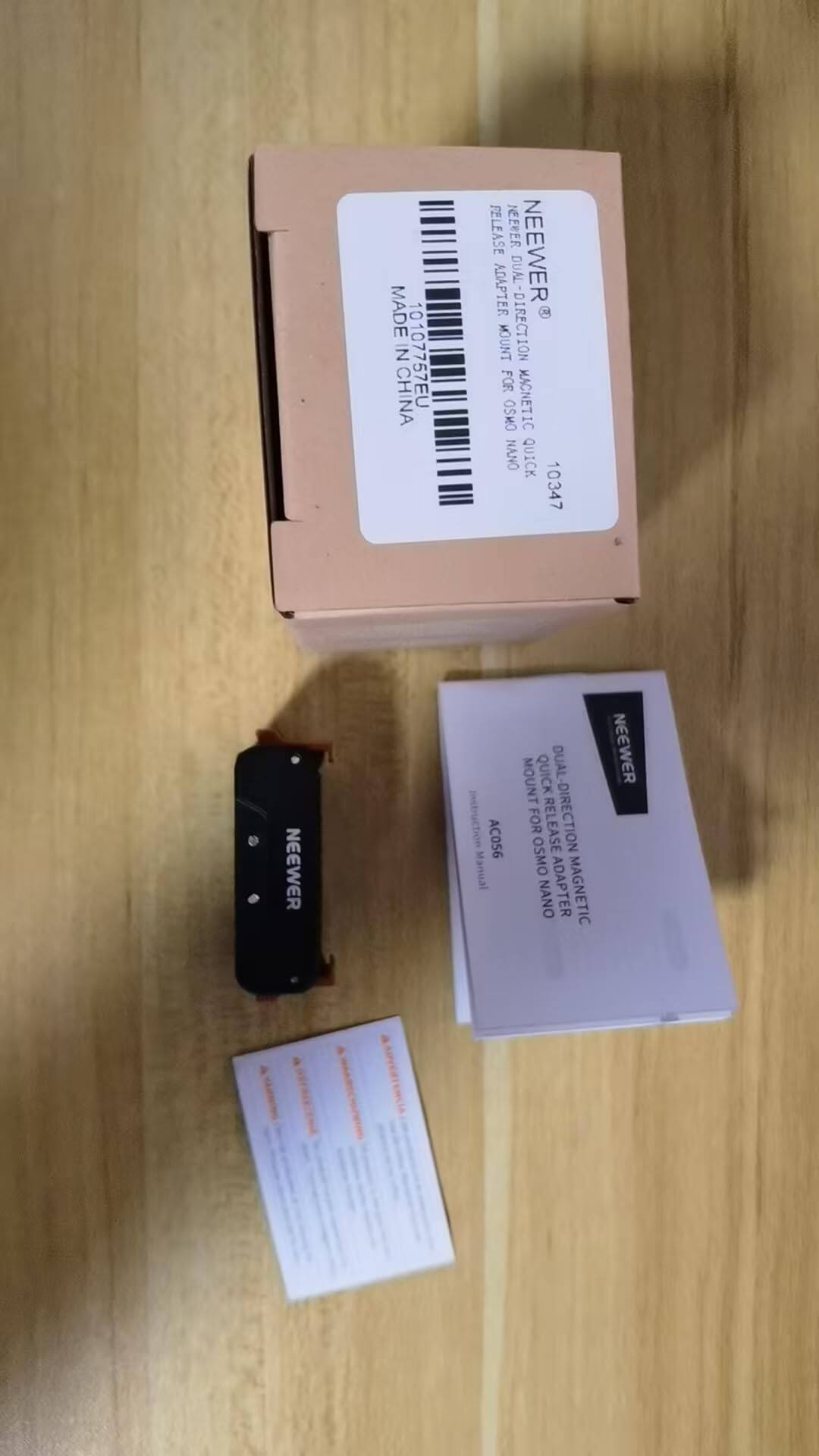 MADE IN CHINA  
10107757EU  
NEEWER  
DUAL RELEASE ADAPTER  
MOUNT - DIRECTION FOR OSMO  
MAGNETIC QUICK RELEASE  
AC056  
Manual  
NEEWER  
QUICK DIRECTION  
MOUNT FOR OSMO NANO  
MAGNETIC RELEASE ADAPTER  
AC056