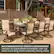 The image shows an outdoor patio setup that can accommodate eight guests comfortably. It includes an expandable rectangular cast-top table and eight sling swivel stationary dining chairs. The arrangement is designed to provide a comfortable and inviting space for socializing and dining outdoors.