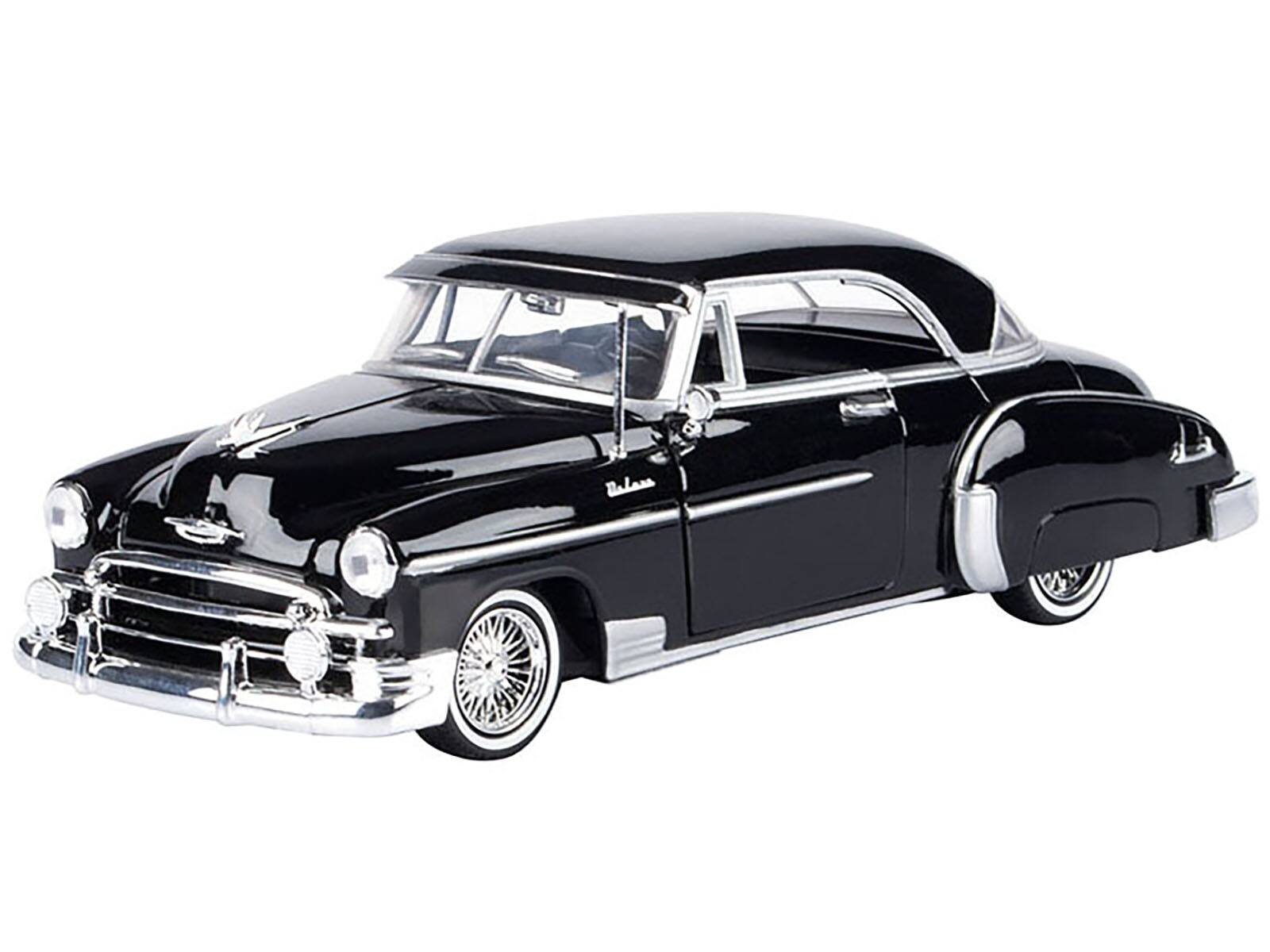 Alt View 1. Motormax - 1950 Chevrolet Bel Air Lowrider Black "Get Low" Series 1/24 Diecast Model Car by Motormax.