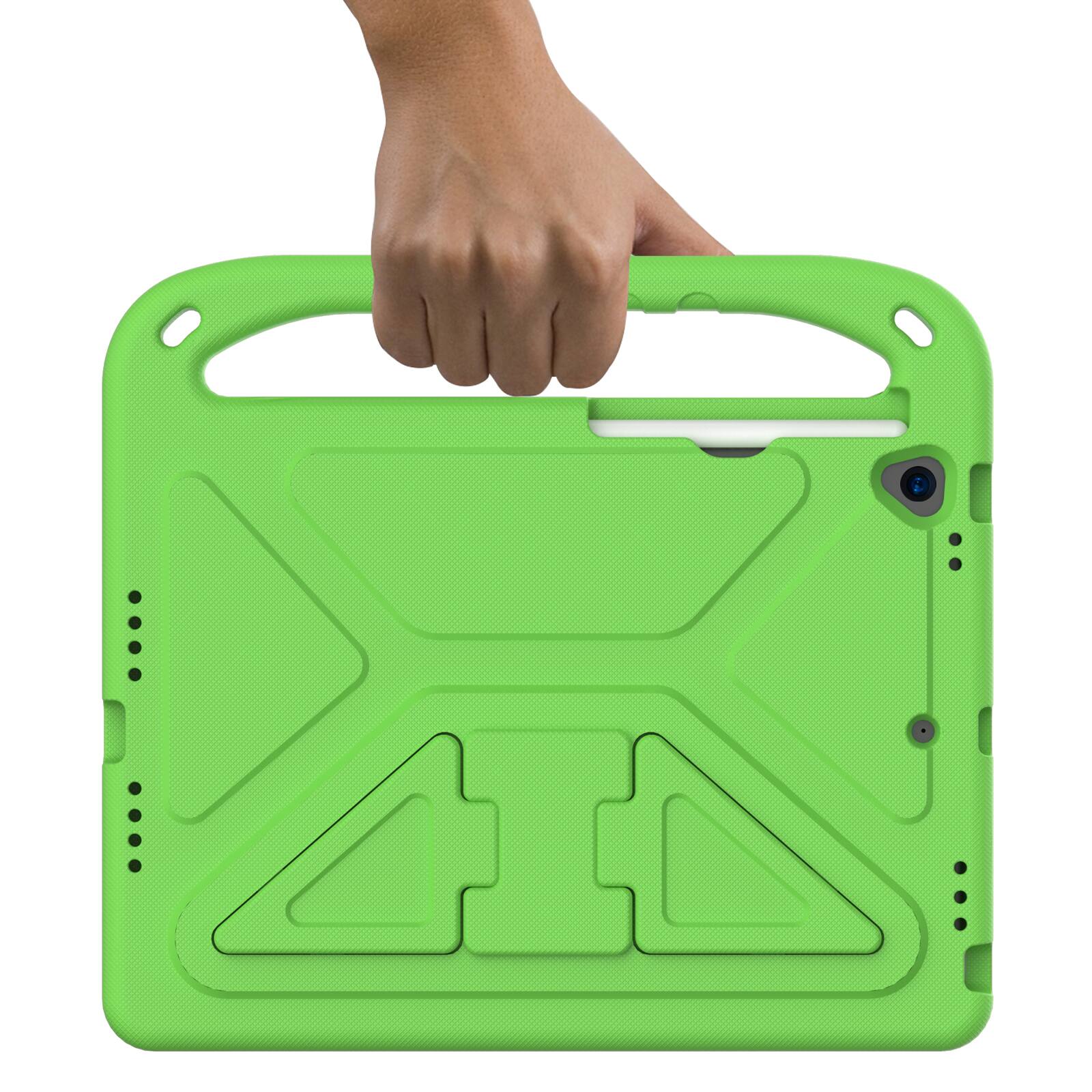 The image shows a hand holding a green tablet case with a textured design and cutouts for the camera and buttons.