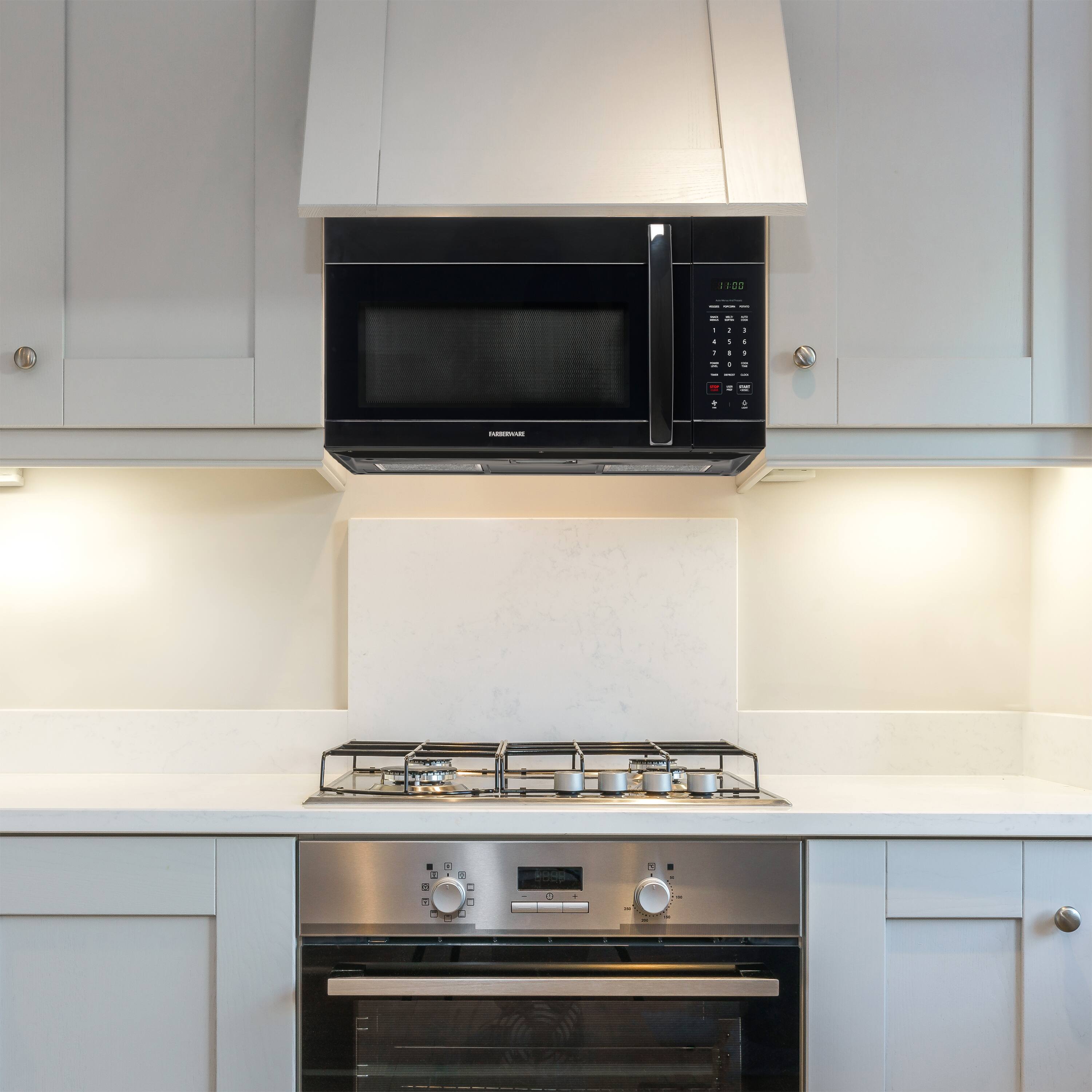 Angle. Farberware - Farberware 1.7 cu. ft. OTR Microwave - 1000W, with Smart Sensor Cooking, Black - Black.