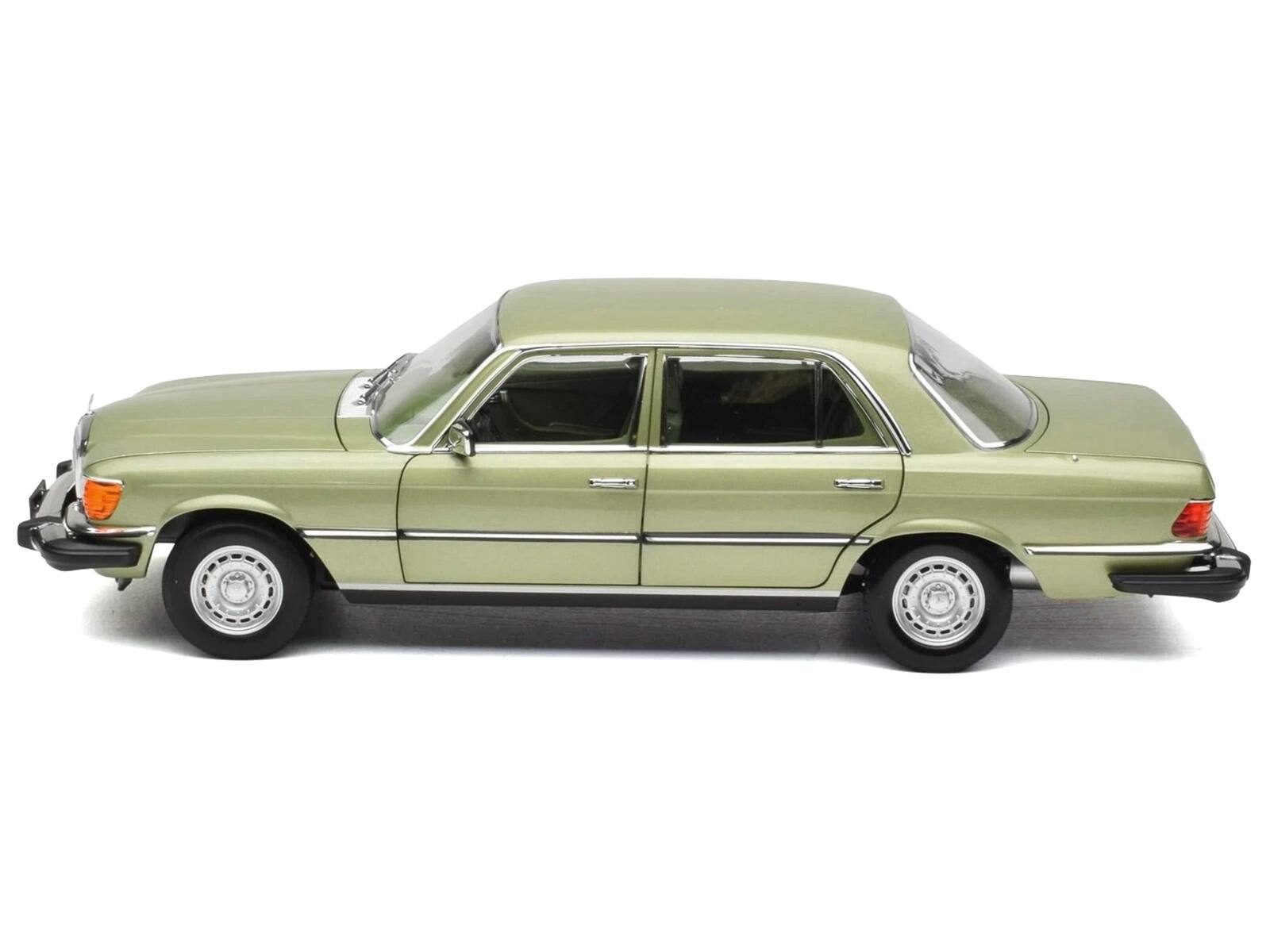 Left. Norev - 1979 Mercedes-Benz 450 SEL (US Version) Silver Green Metallic with Green Interior 1/18 Diecast Model Car by Norev - Silver, Green Metallic.