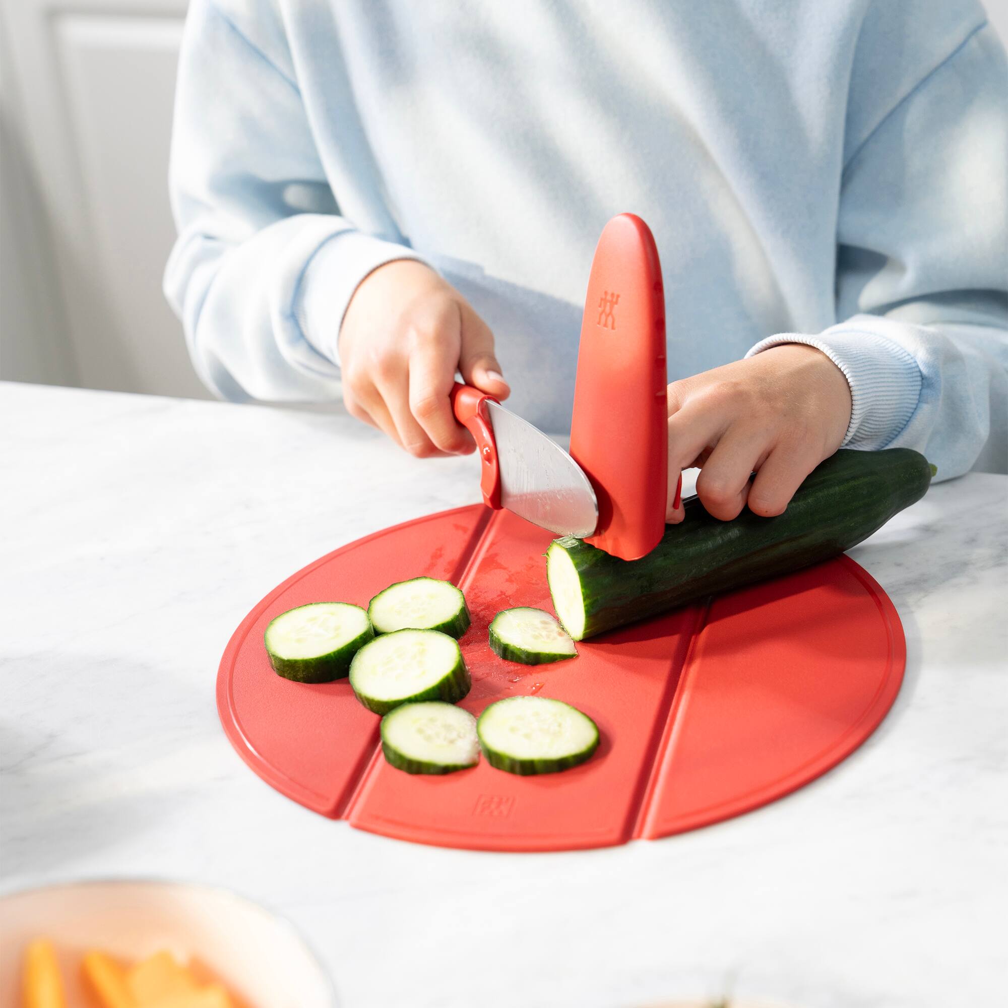 Alt View 1. ZWILLING - ZWILLING TWINNY Kids Chef’s Knife and Silicone Cutting Board 2-pc Set, Red - Red.