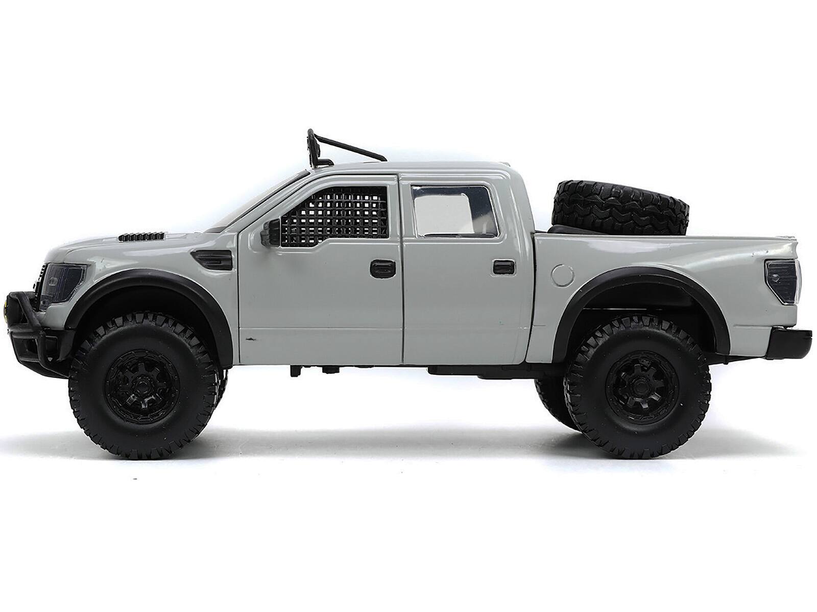 Back. Jada - 2011 Ford F-150 SVT Raptor Pickup Truck Light Gray with Extra Wheels "Just Trucks" Series 1/24 Diecast Model Car by Jada - Light Gray.