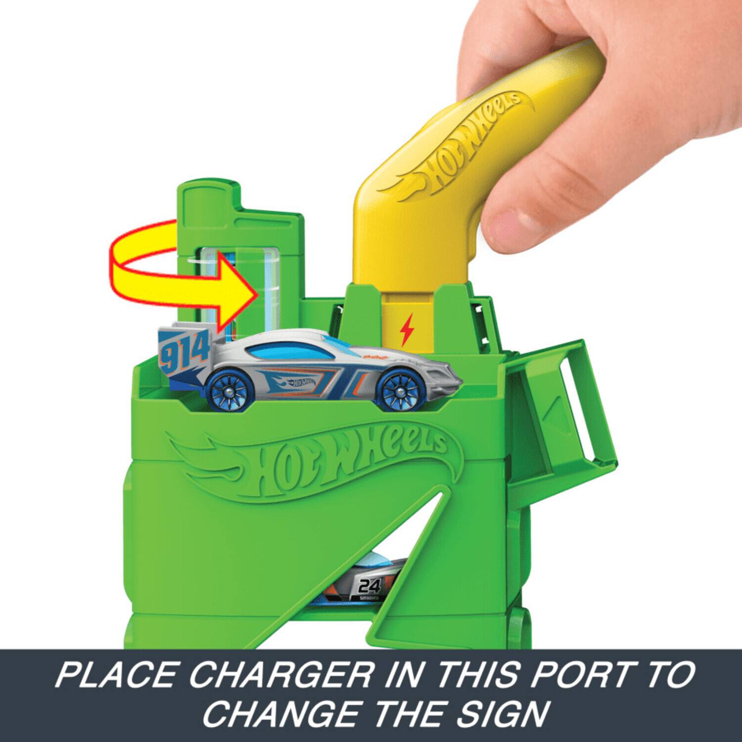 HOWHeeLS 914 C:0 HOWHeeLS 24 PLACE CHARGER IN THIS PORT TO CHANGE THE SIGN