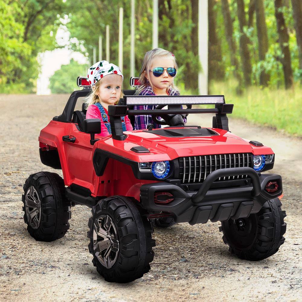 Angle. BreeBe - 12V 2-Seater Police Ride On Truck with Remote, Siren, Music & Horn, Battery-Operated Electric Car for Kids - Red.