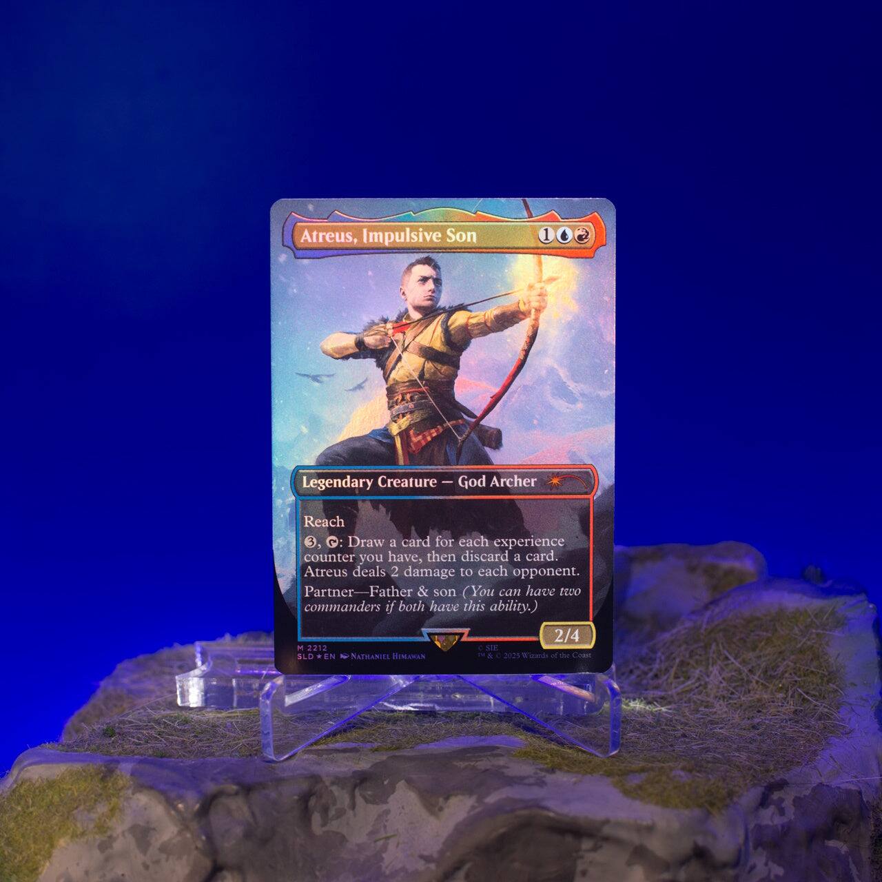 Atreus, Impulsive Son  
Legendary Creature - God Archer  
Reach  
2, 0: Draw a card for each experience counter you have, then discard a card. Atreus deals 2 damage to each opponent.  
Partner—Father & son (You can have two commanders if both have this ability.)  
2/4  
M 2212  
SIE SLD * EN  
NATHANIEL HIMADOON  
& 2025  
Wizzards of the Coast
