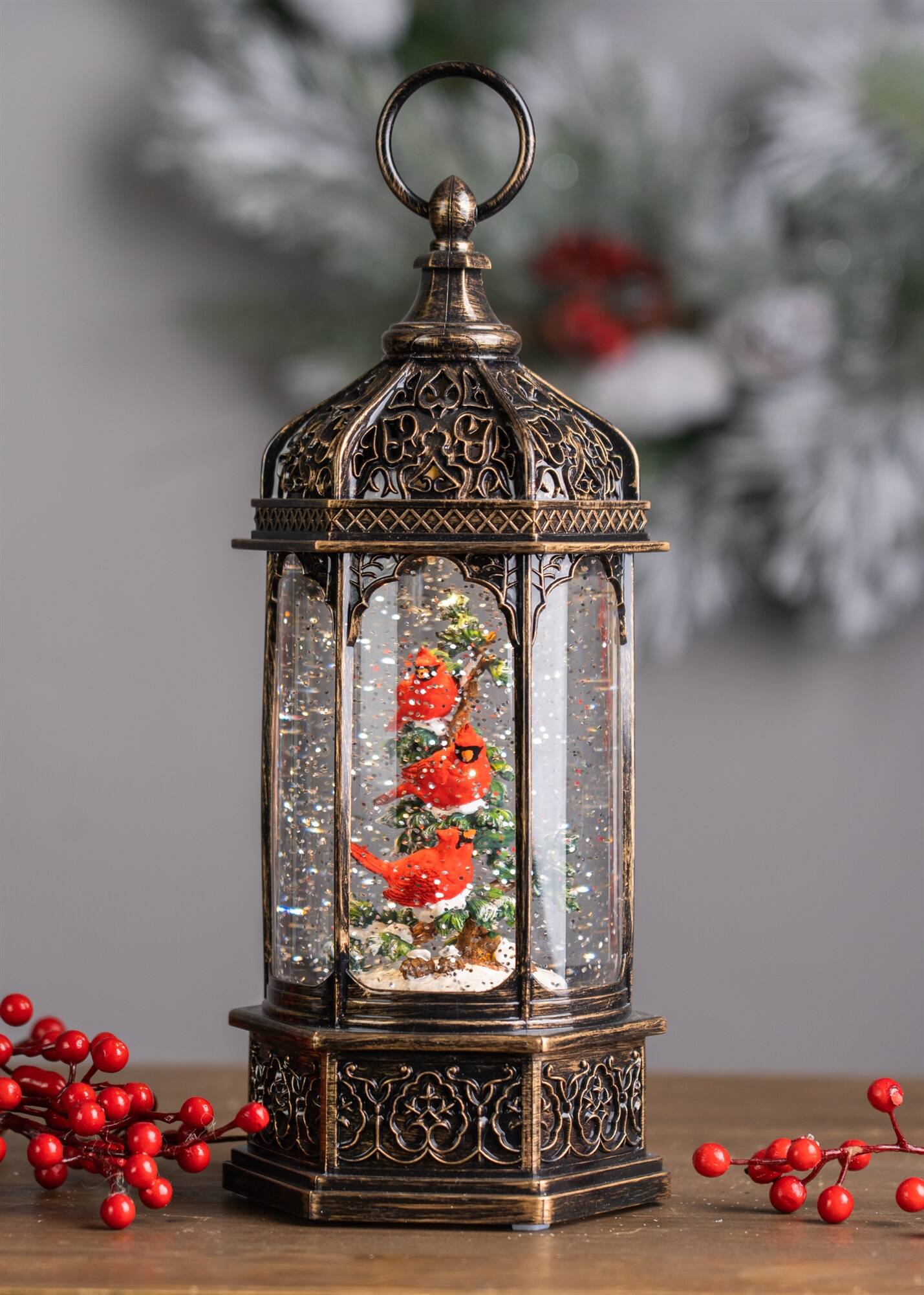 Angle. BreeBe - LED Snow Globe Lantern with Cardinal Bird Branch 13"H - Bronze, Red, Green.
